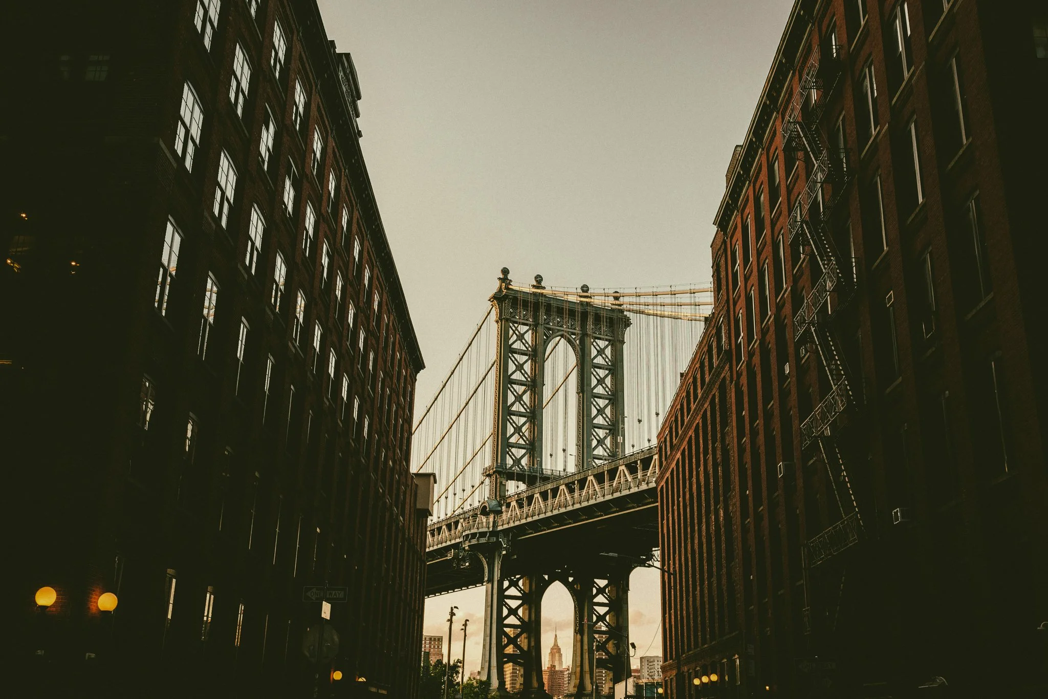 Iconic New York bridge showcasing historic engineering and urban architecture