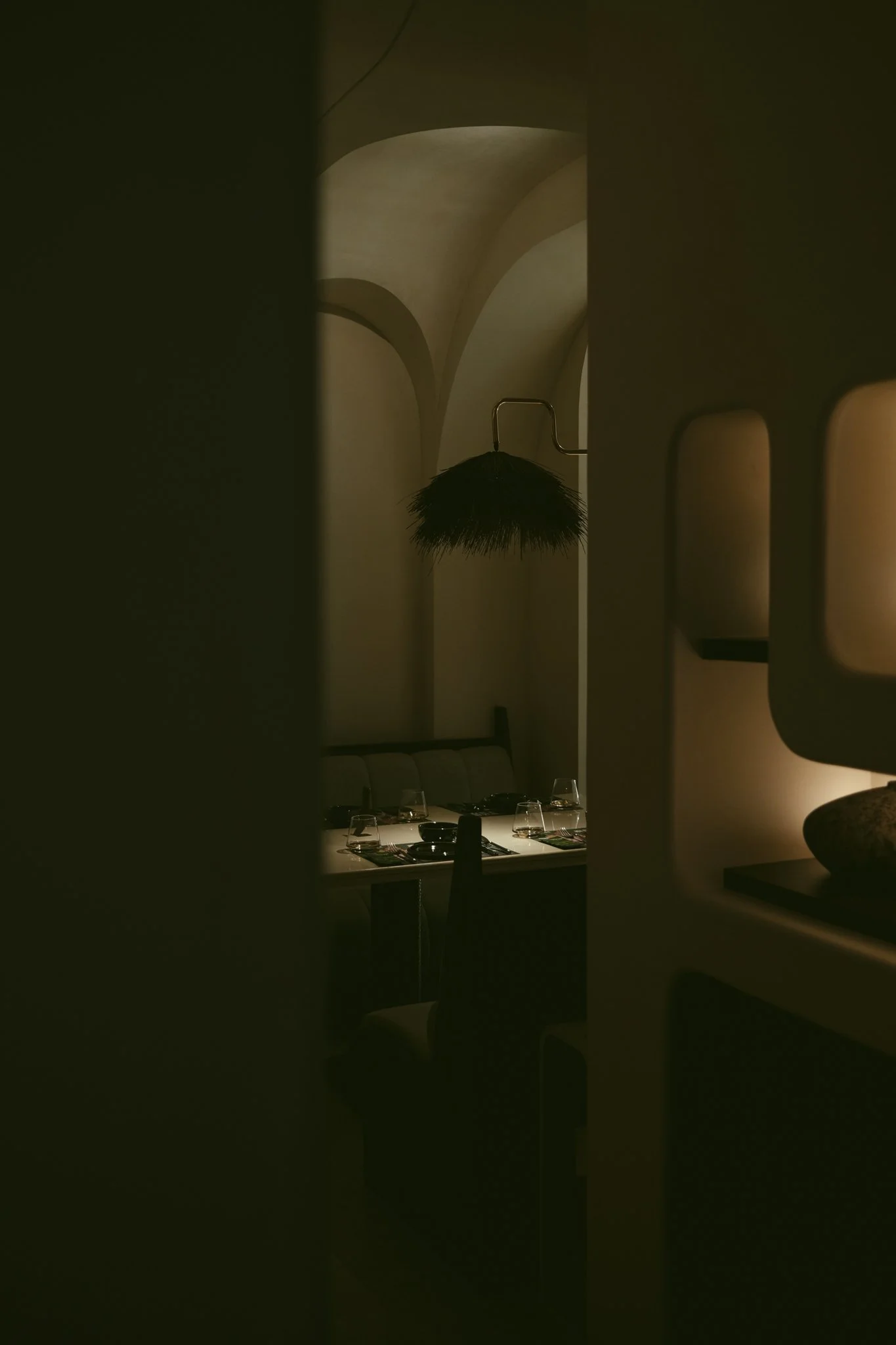 Modern designer restaurant interior featuring architectural lighting and contemporary furniture