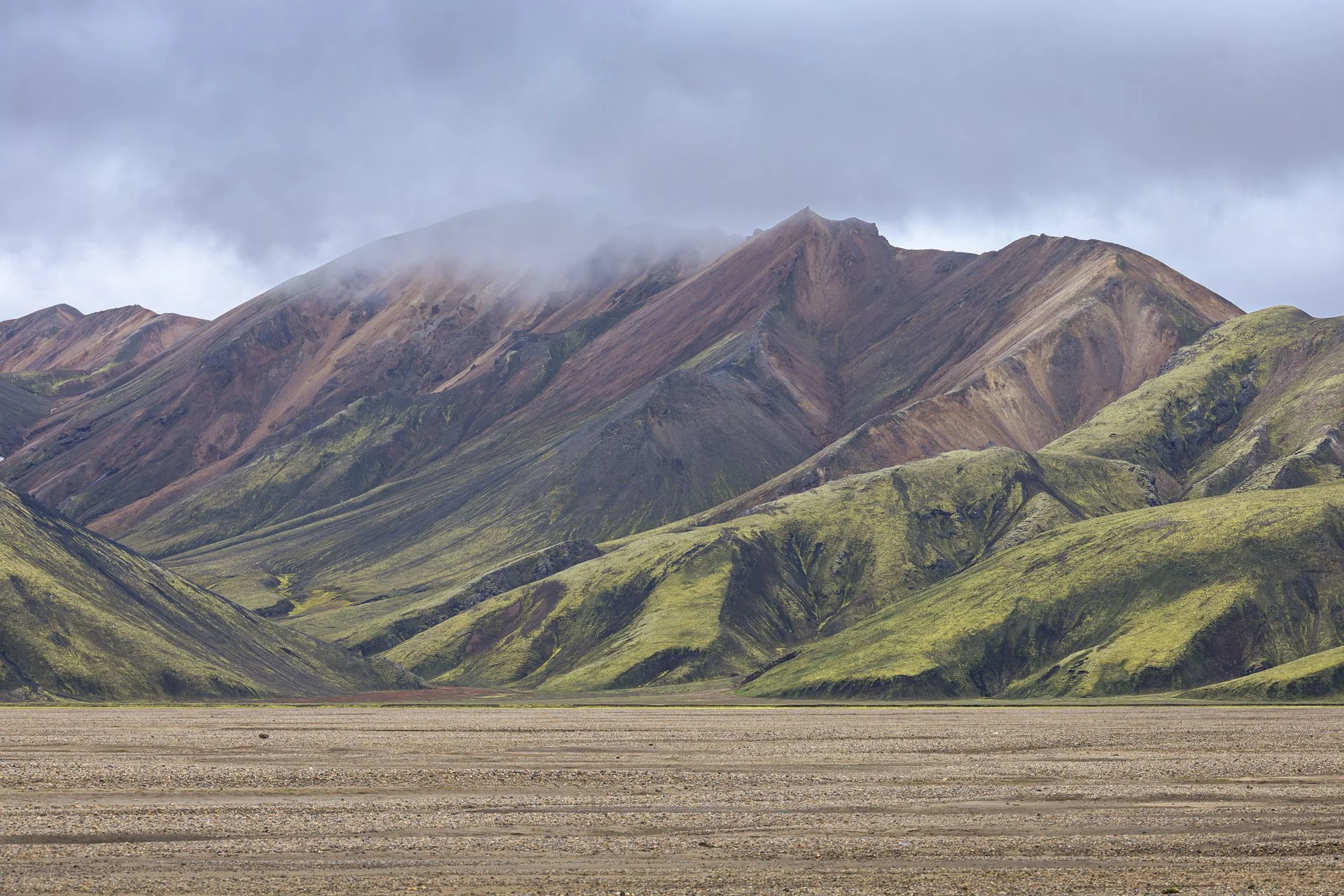 I captured this picture on the morning we left Landmannalaugar. It was early and it had been raining as we left. No one was on the dirt road that leads out of the Highlands. The light was perfect and I grabbed this shot. What struck me was how absolu