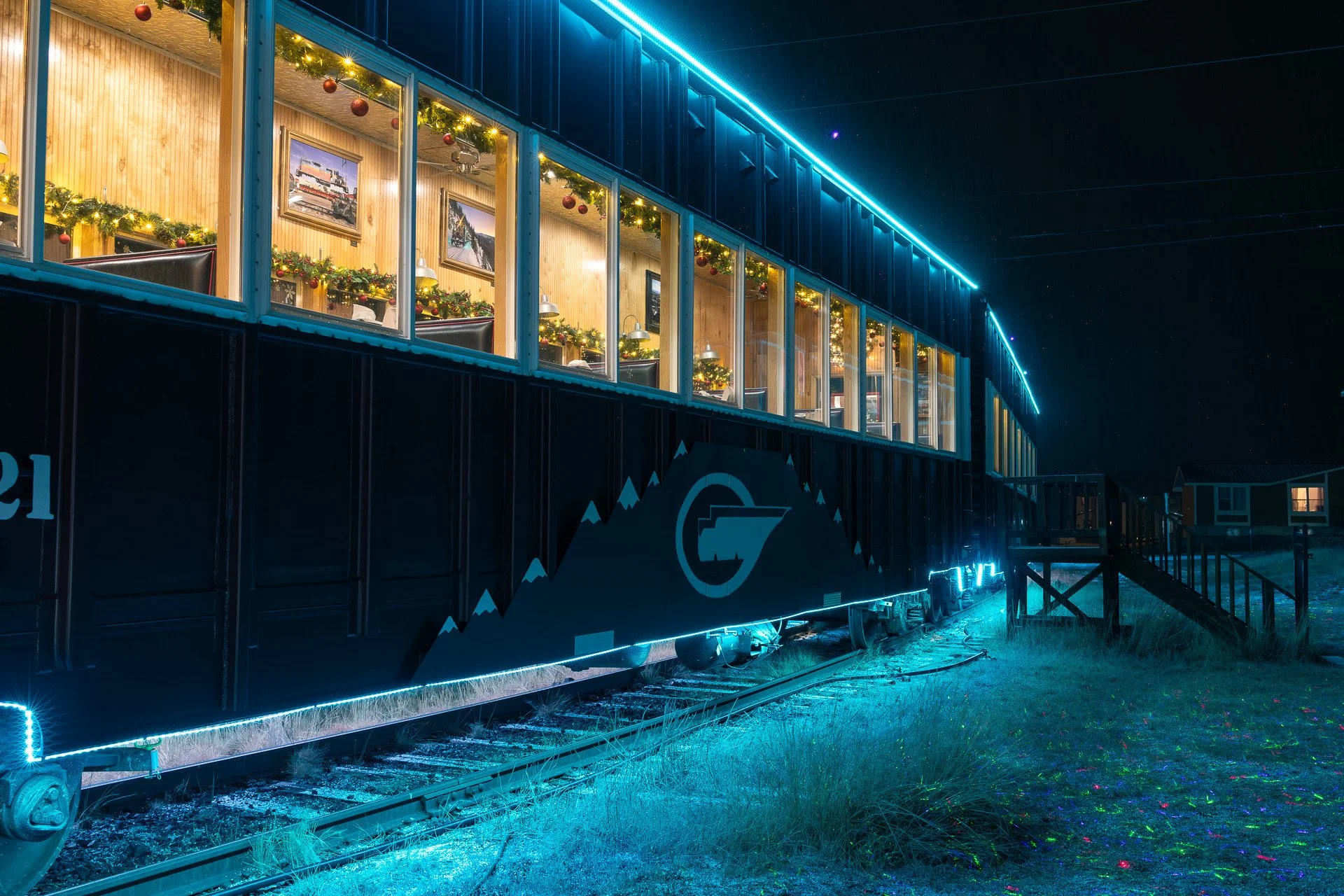 Warm interior lights of the Holiday Express train in Leadville contrasting the cold winter night outside