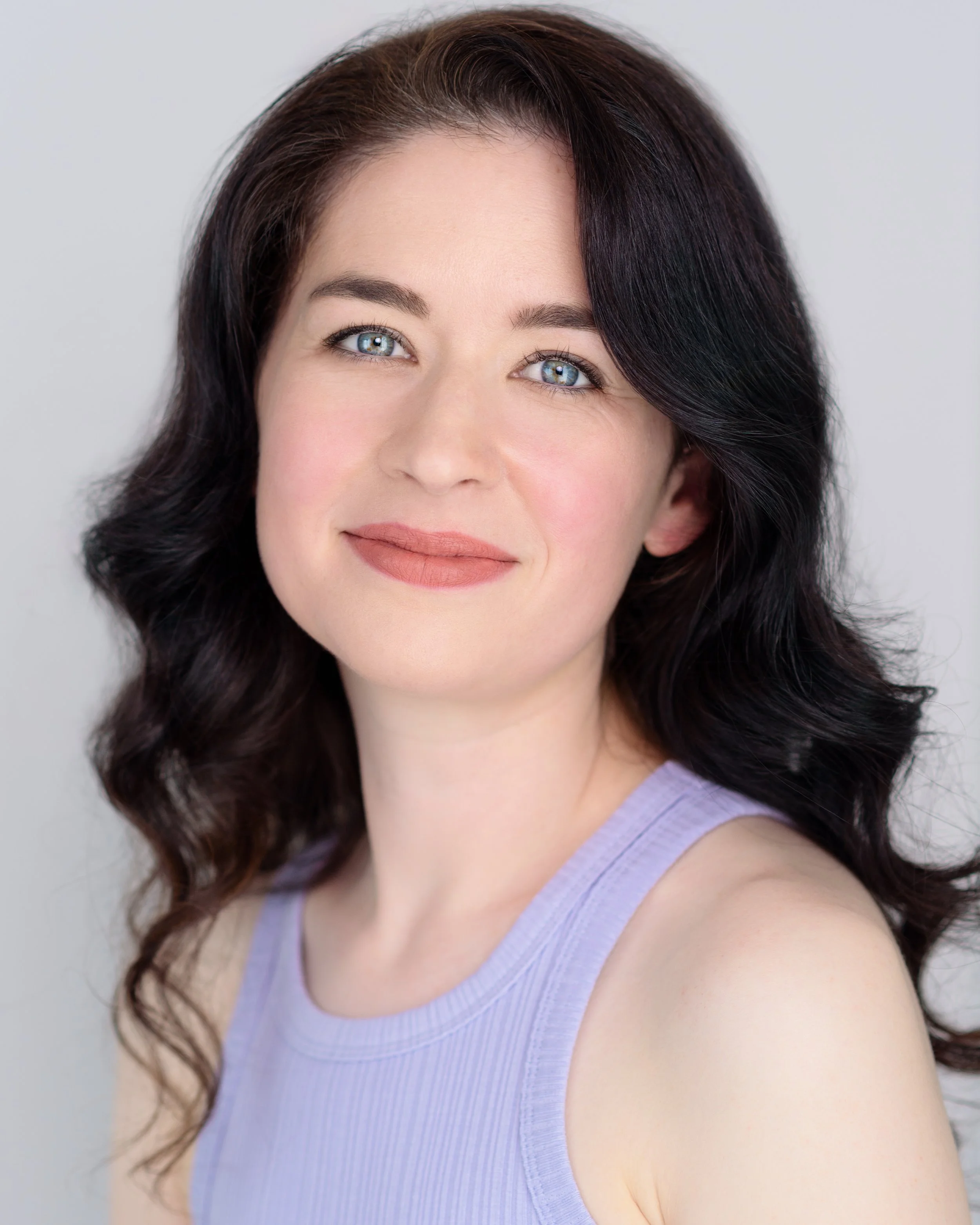 Serious headshot with head tilted of Sydney actor musician Lauren Carey Kevin