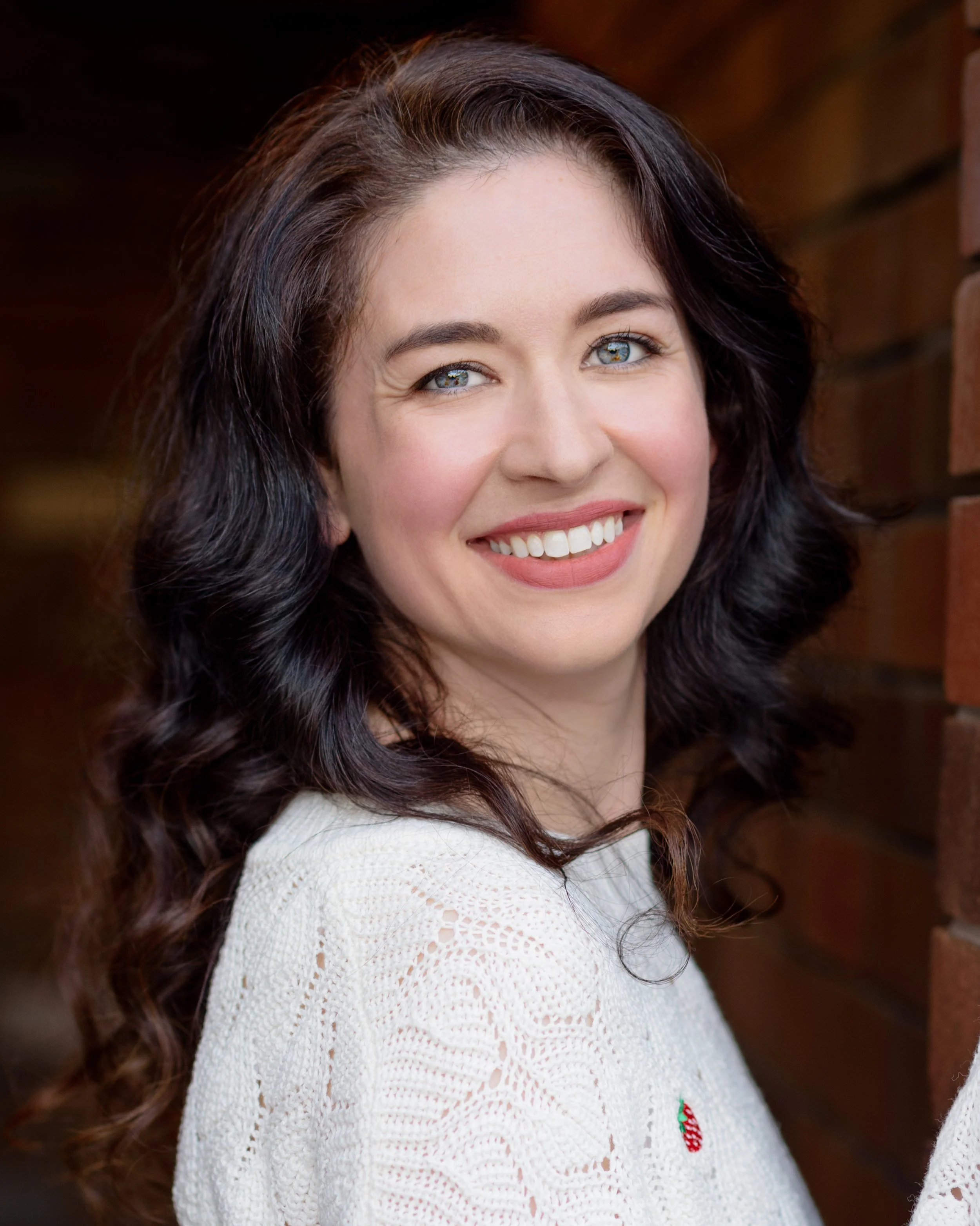 Smiling headshot of Sydney pianist and vocalist Lauren Carey Kevin