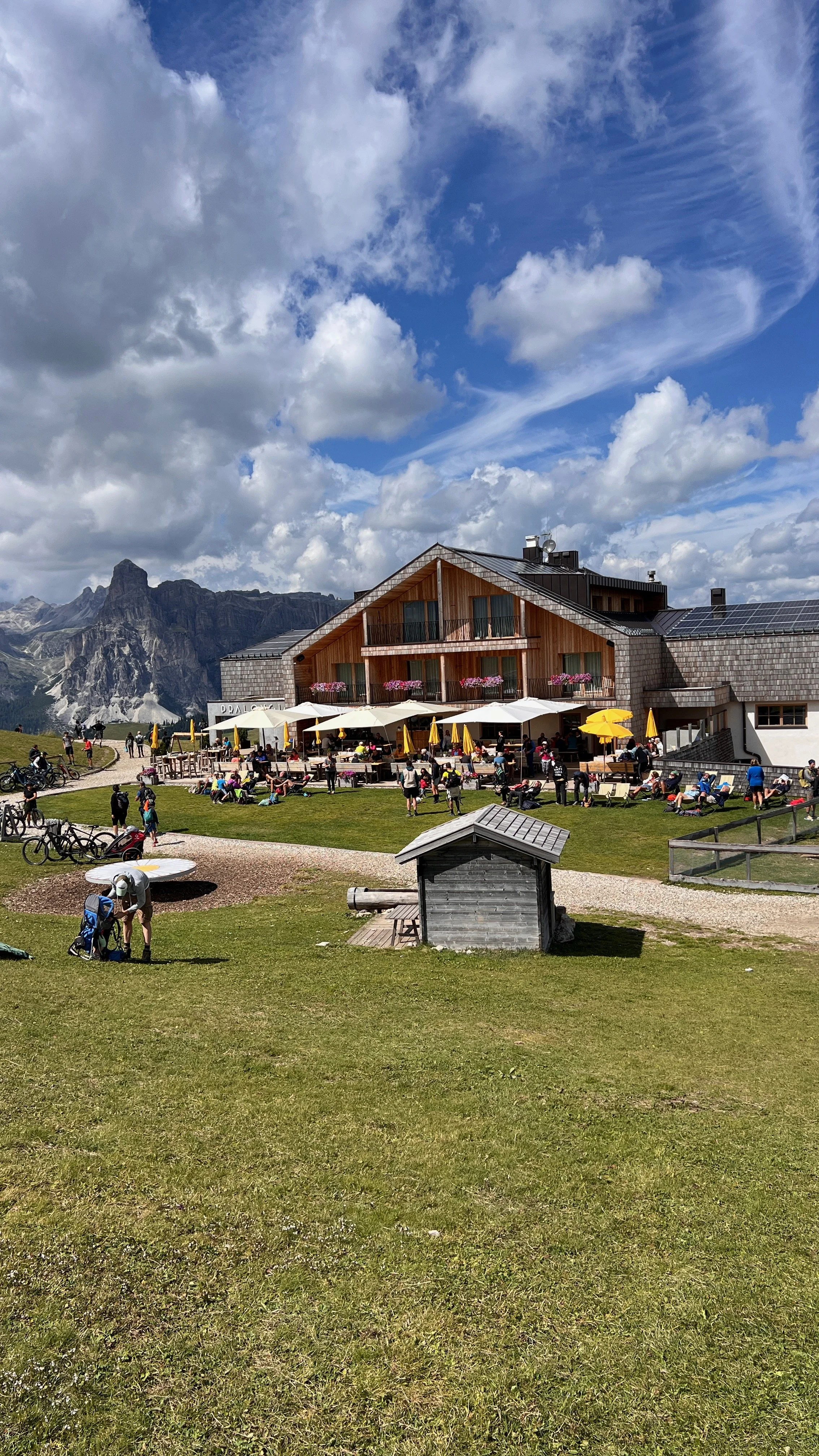 Dolomites mountain hut surrounded by alpine scenery