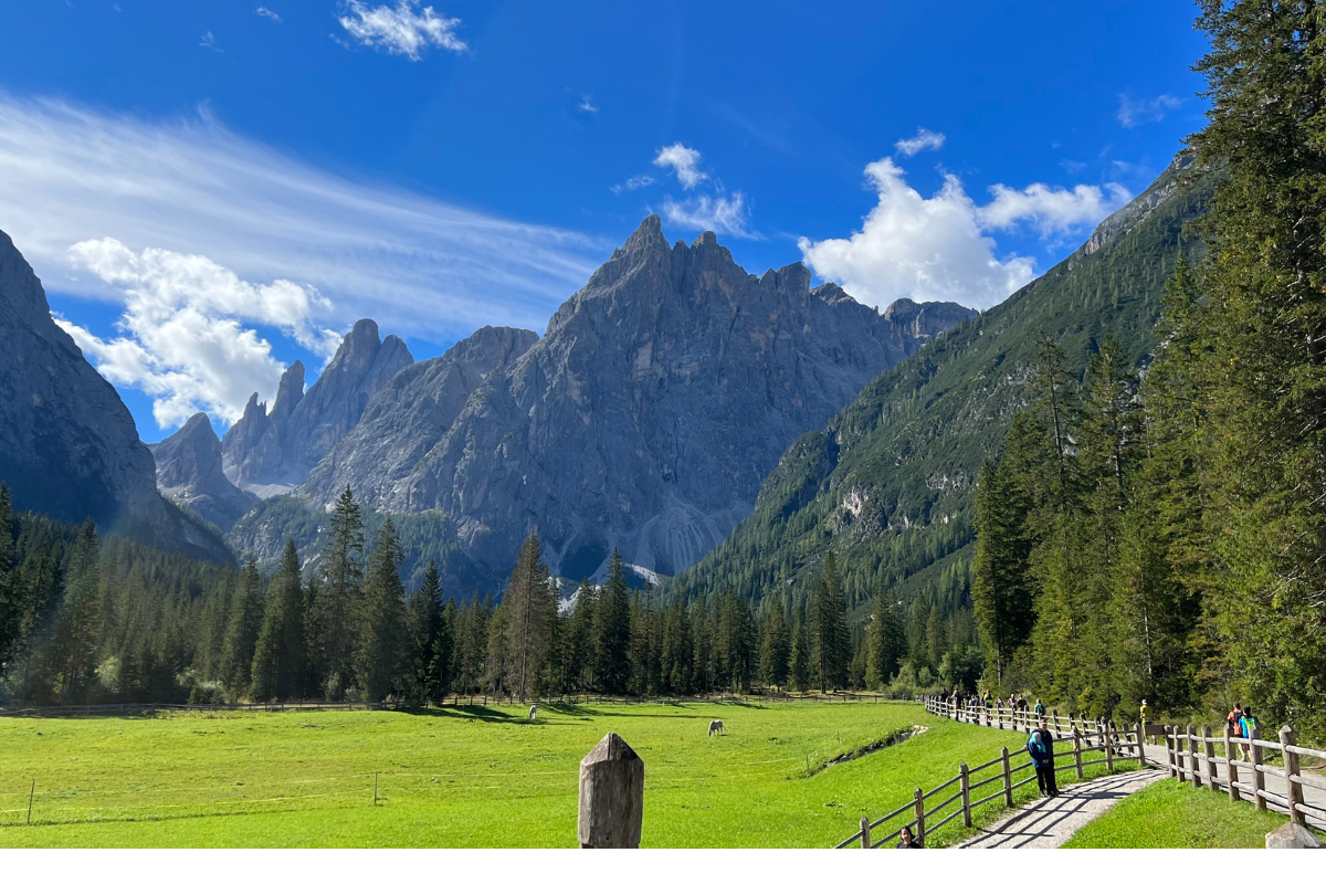Free Dolomites base guide comparing Val Gardena, Alta Badia, the 3 Peaks area, and Cortina