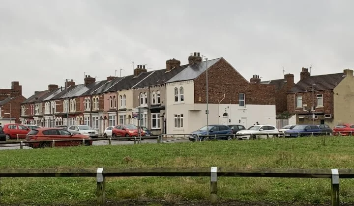 Row of terraced housing adjacent to the Gresham Development site in Middlesbrough, highlighting the urban setting of the site investigation.