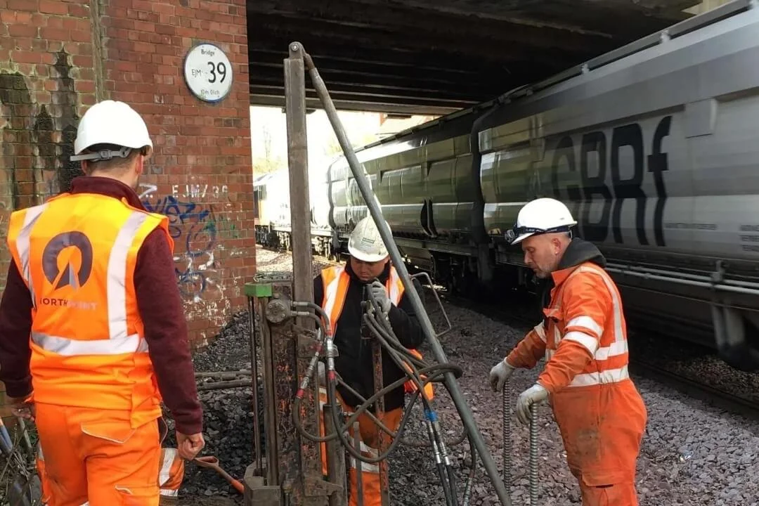 Northpoint engineers performing Phase 2 intrusive site investigation beside railway infrastructure