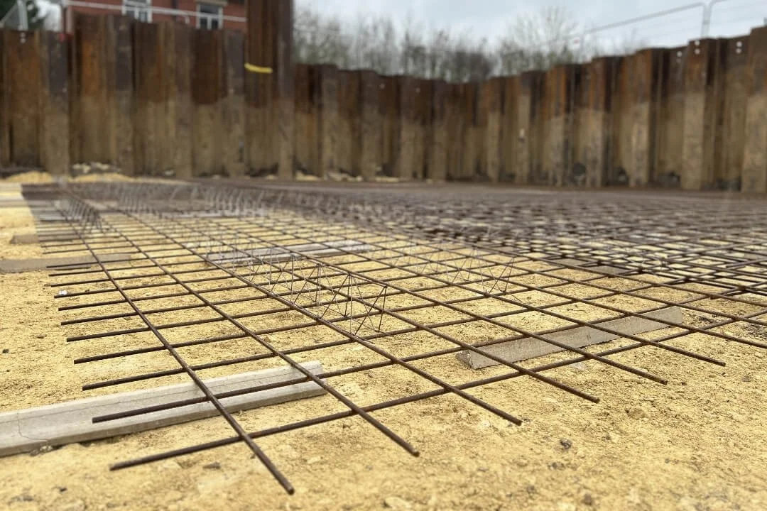 Steel reinforcement mesh laid out for a concrete foundation, showcasing Northpoint's geotechnical design and earthworks specifications for safe construction.