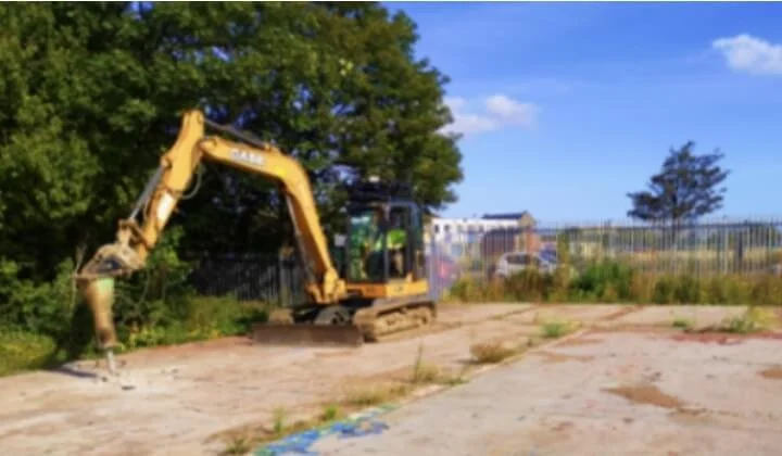 Excavator carrying out intrusive ground investigation for Outwood Academy site in Middlesbrough