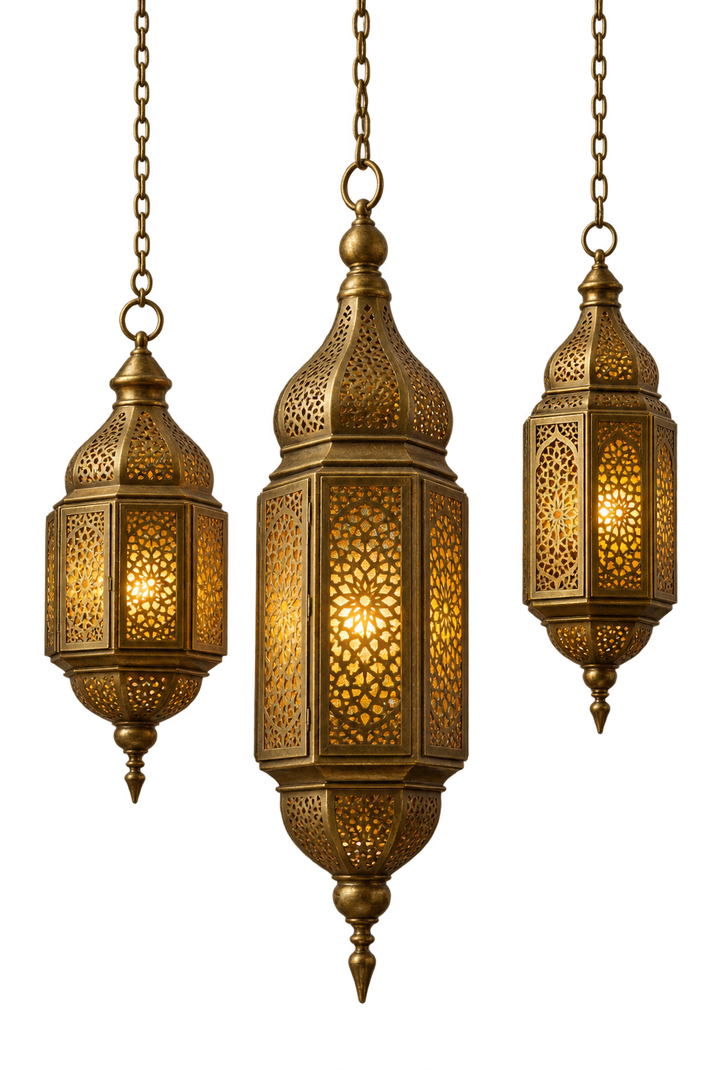 Three ornate Moroccan-style gold lanterns with intricate patterns, hanging and lit with warm glowing lights.