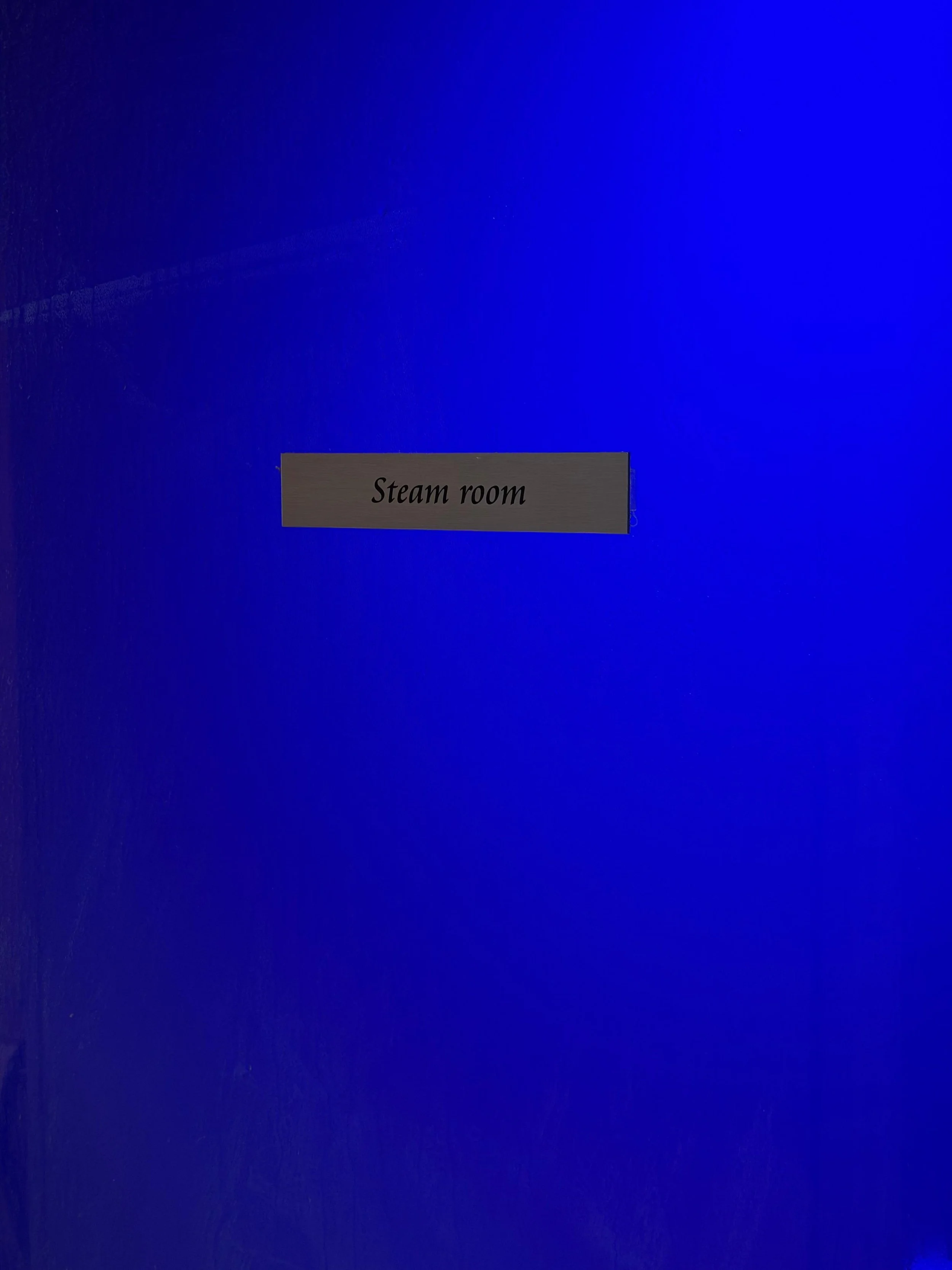 steam room door with "steam room"