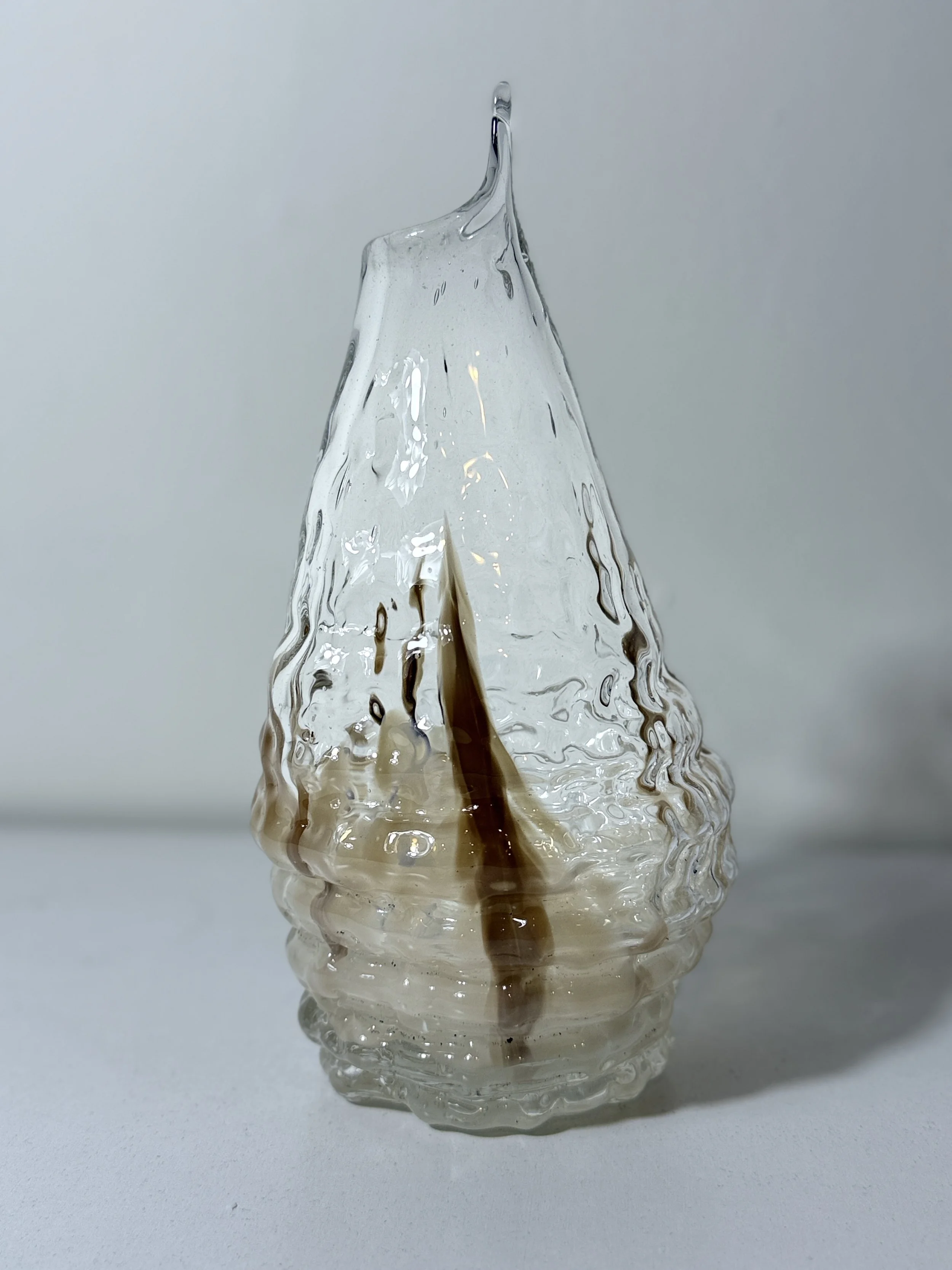 organically shaped cream and brown feathered glass carafe with pulled beak and bird eyes