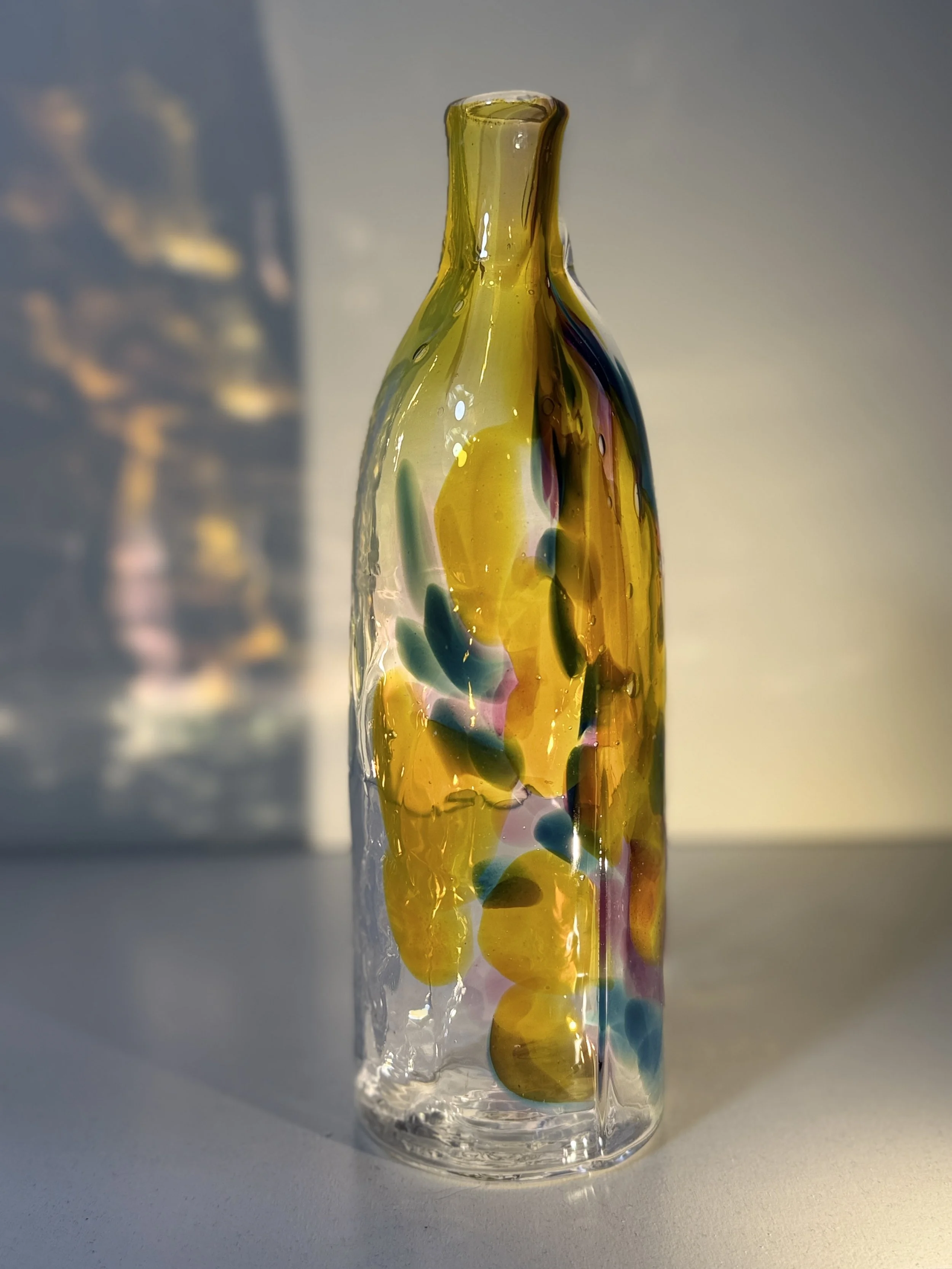 a bottle in lieu of a logo from D and K Collectibles