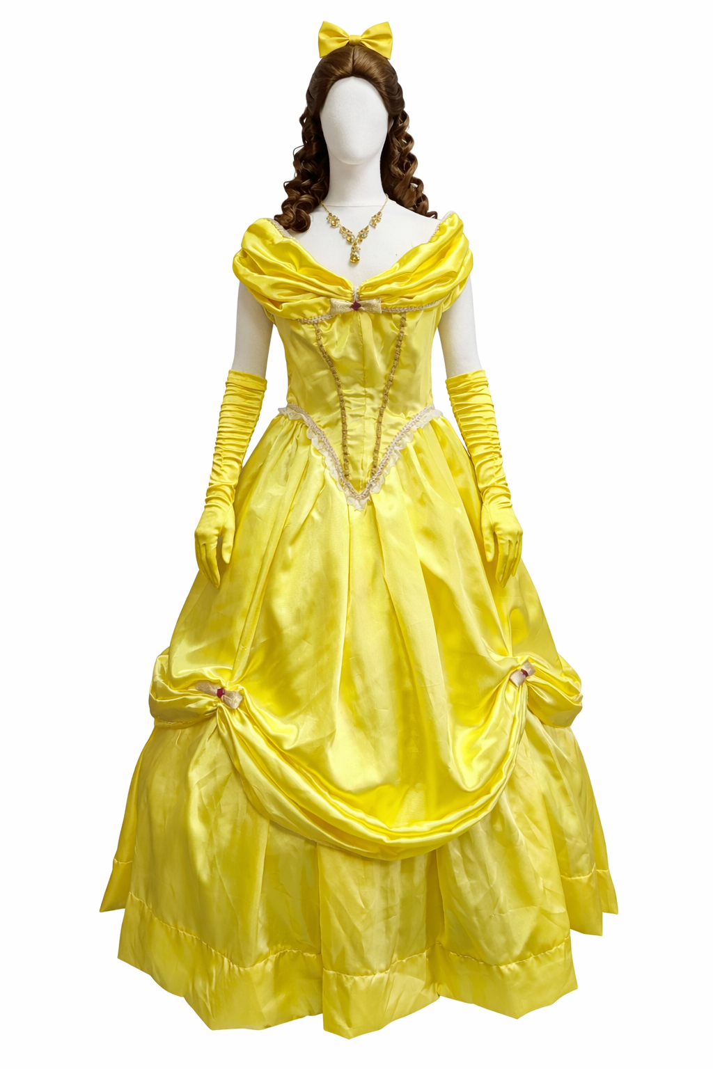 A fancy yellow ball gown on a mannequin with a faceless head, long yellow gloves, and a matching yellow bow in its hair. Belle, Beauty and the Beast.