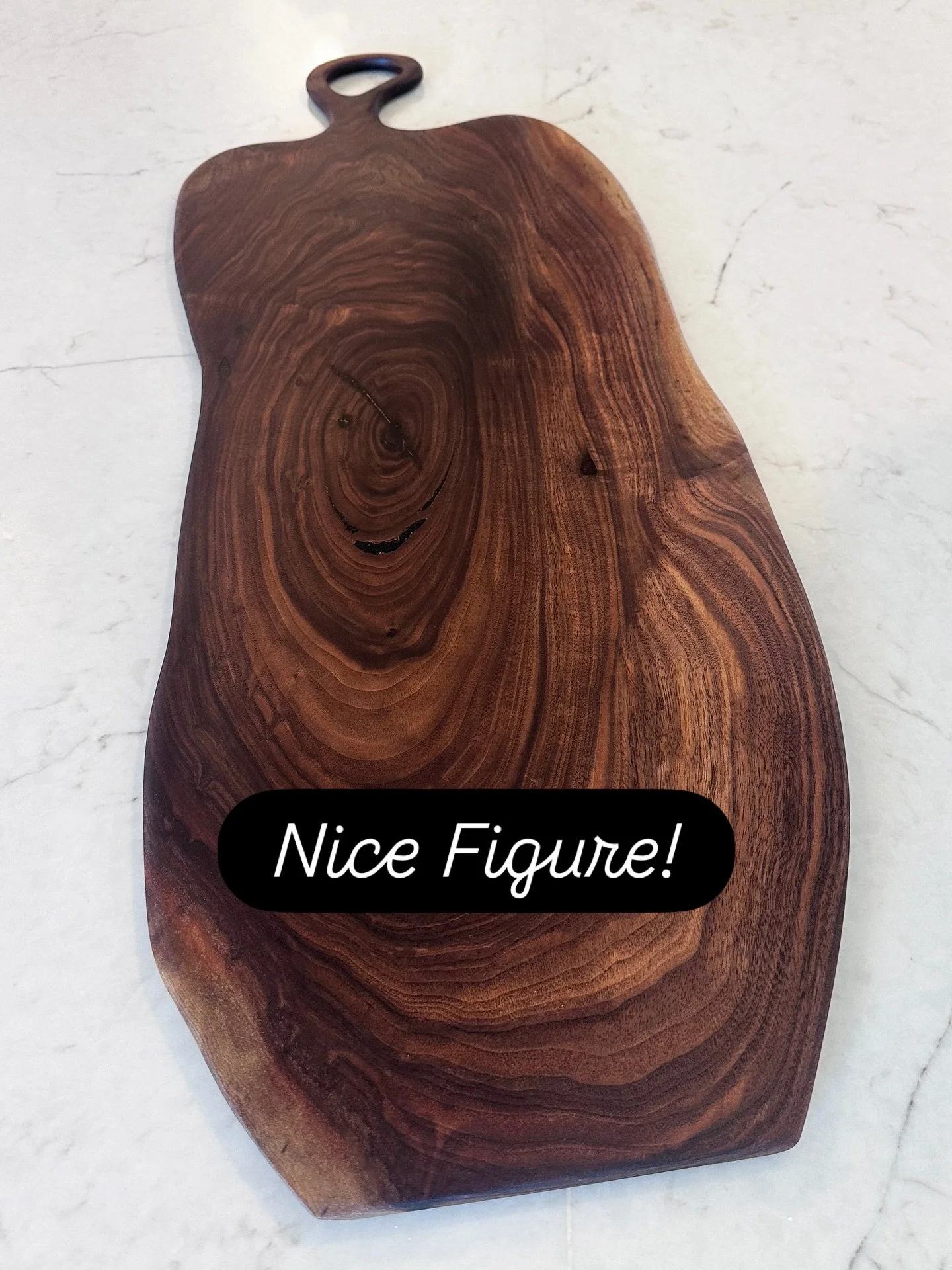 A timeless statement piece, crafted with purpose.
This 31”x12” charcuterie board showcases the natural beauty of live edge walnut—each curve and grain pattern uniquely shaped by nature, not machines. Perfectly sized for generous s