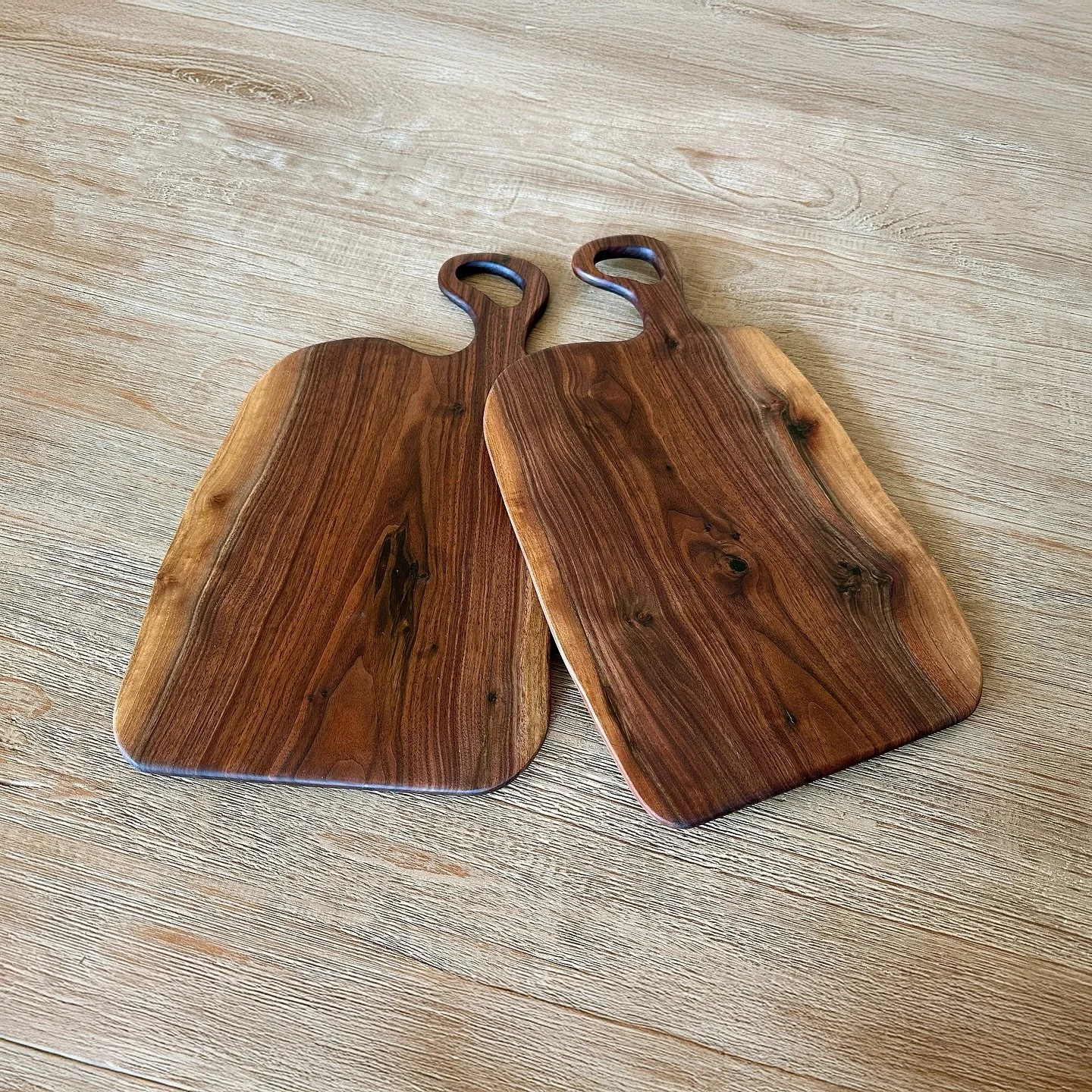 Twins Designed for Show
Two 19-inch walnut beauties ready to steal the show. These handcrafted charcuterie boards are built for gatherings, with rich walnut grain that makes every spread look like art. 
Whether it’s cheeses, cured meats, or f