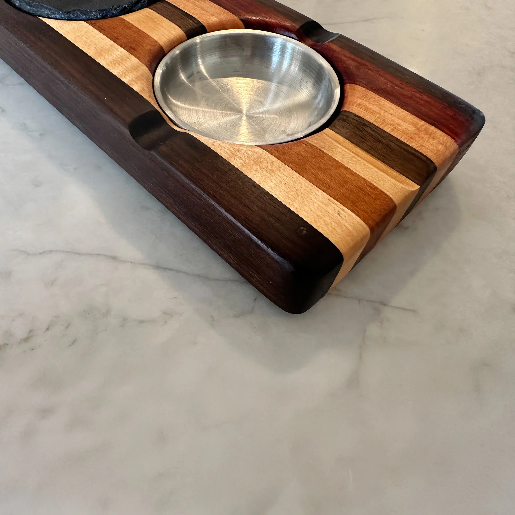 Cigar center designed for enjoying on your patio. using a stainless steel insert ashtray.