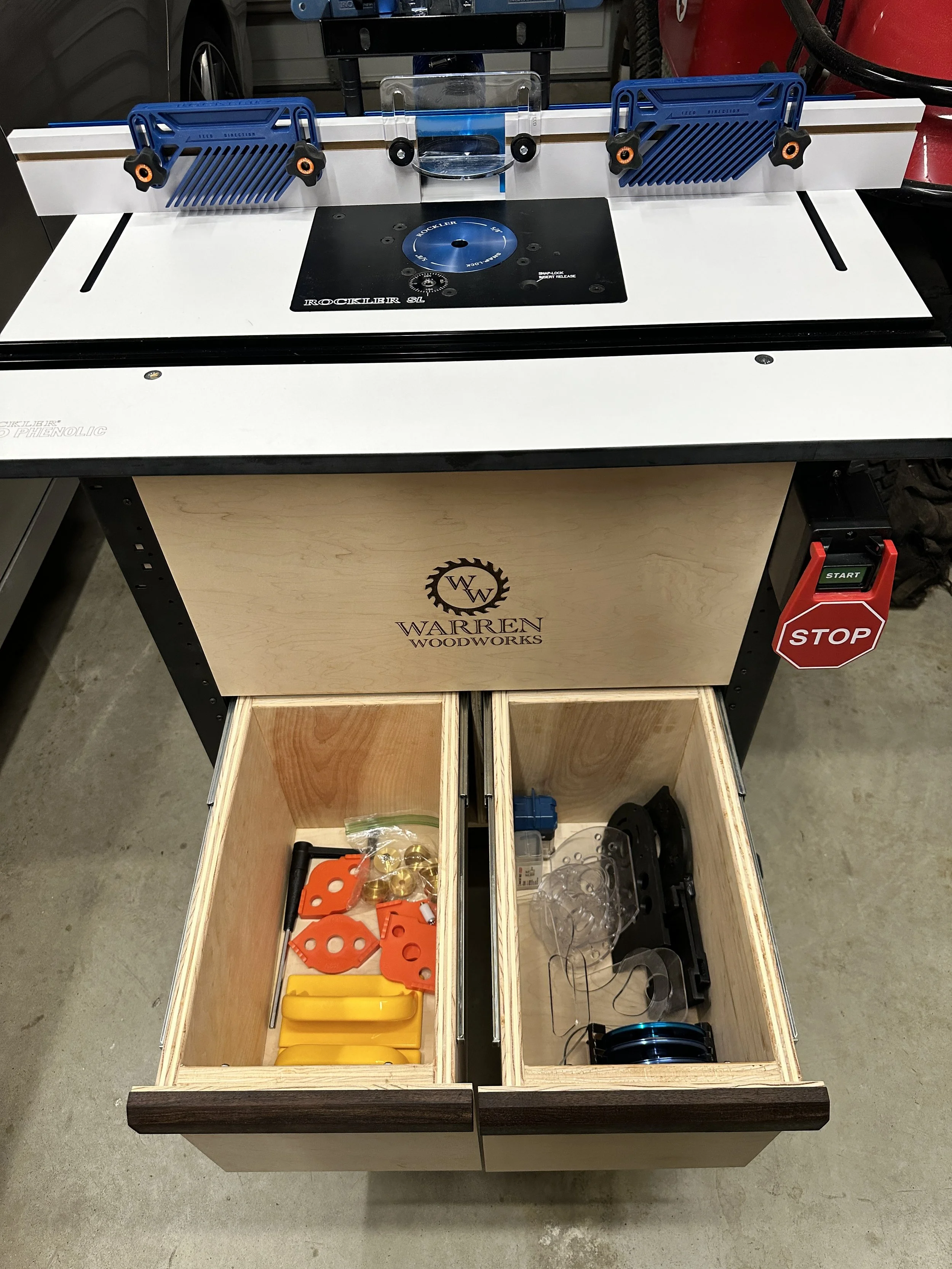 Rockler router table with custom cabinet and drawers.
