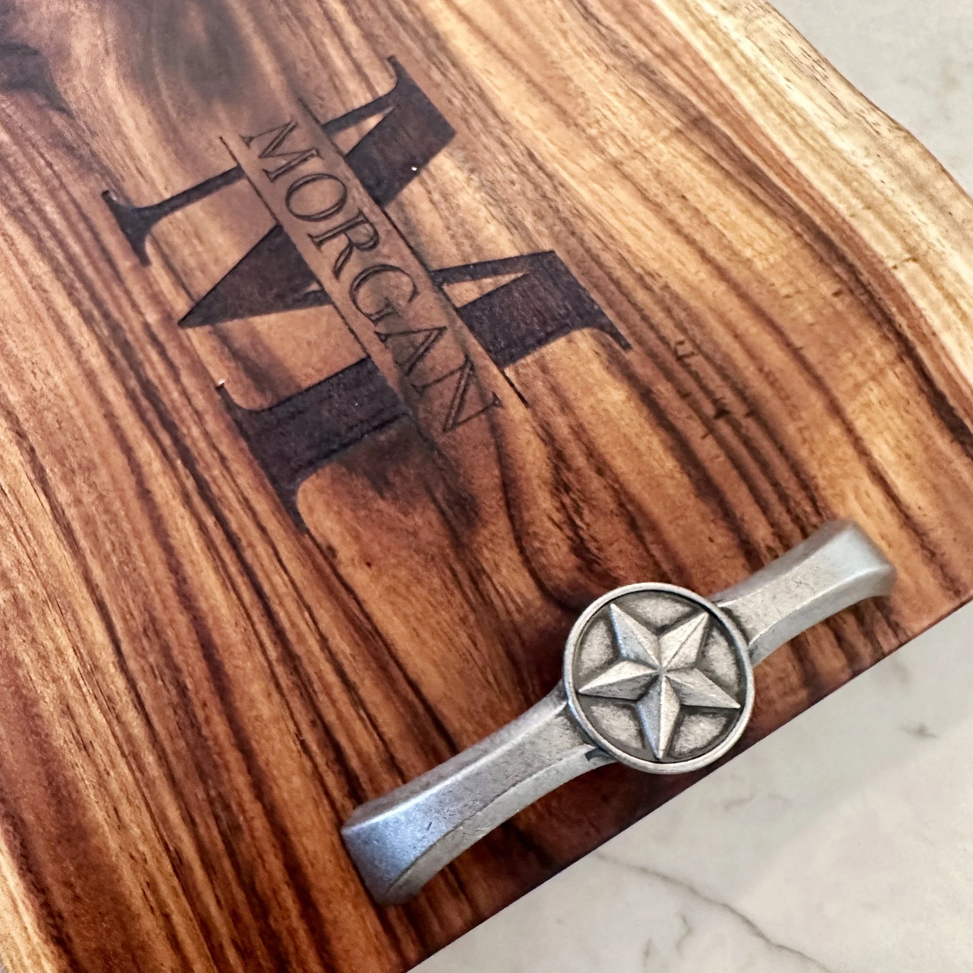 Serving platter features pewter handles with the Texas star.