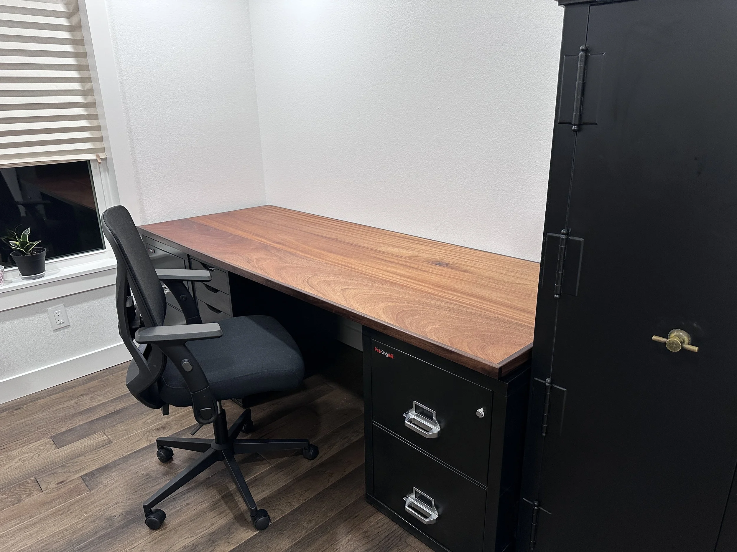 Office desk designed and crafted for a residential home office. Measuring 90 x 33.5, crafted from African Edinam and Edged with Walnut, assembled with Dominoes.