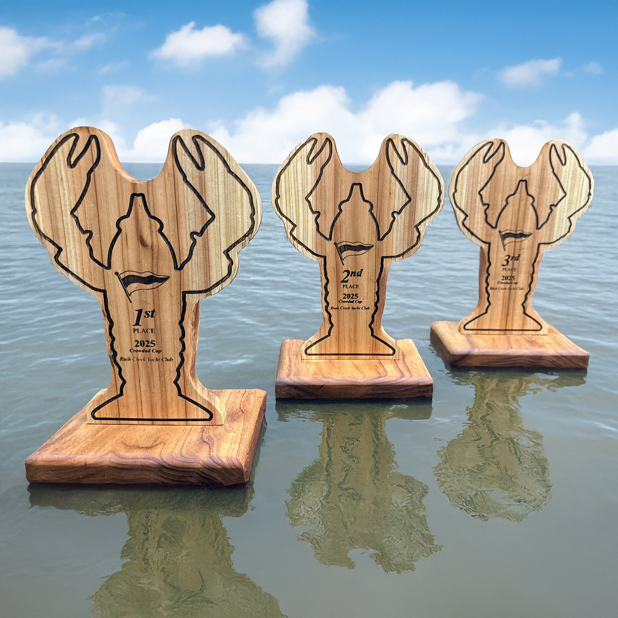Custom-designed sailing trophies from American Cedar in the shape of Crawfish. Created for the Rush Creek Yacht Club's Annual Crawdad Cup sailing race.