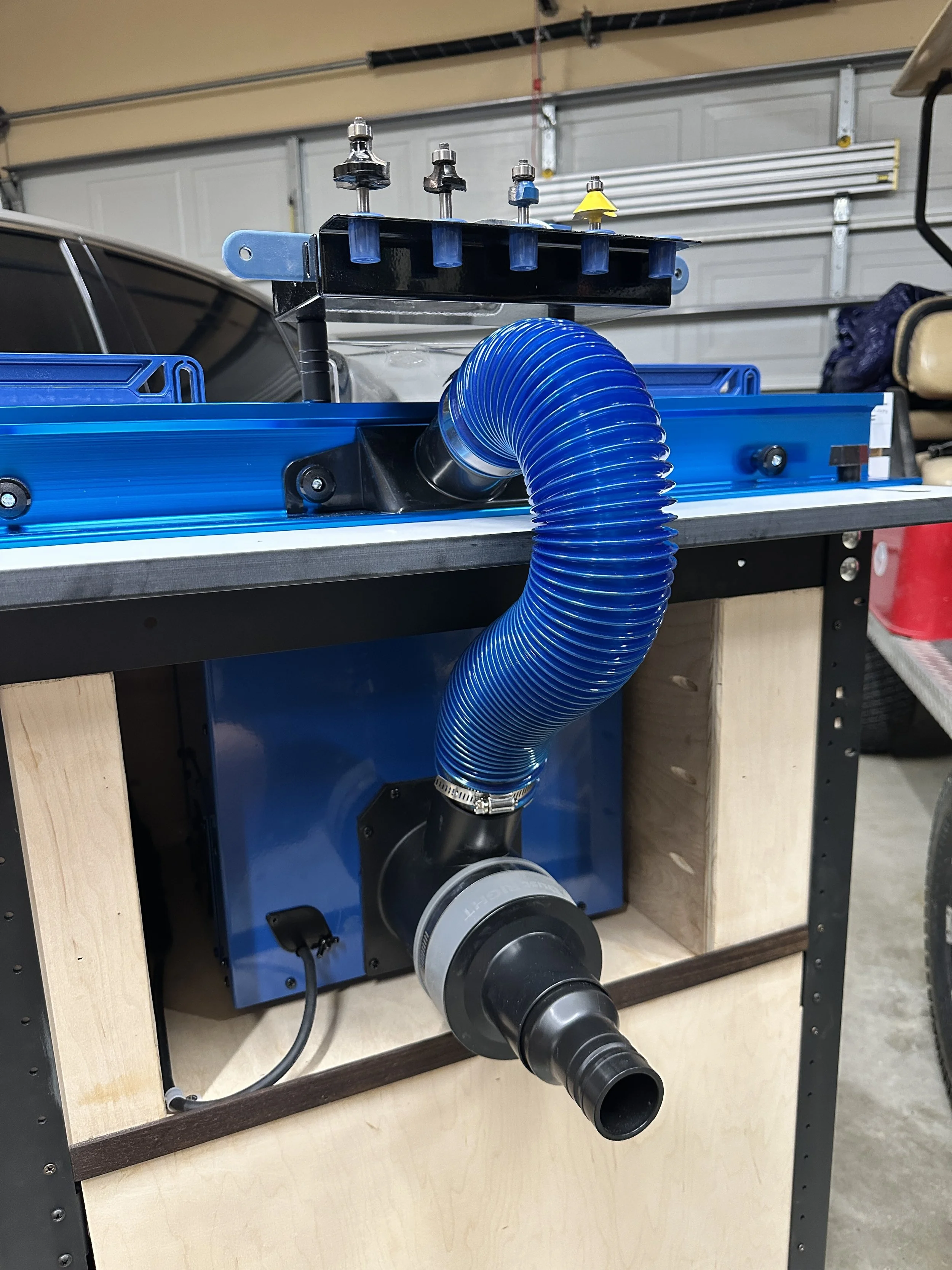Rockler router table with dual dust collection.