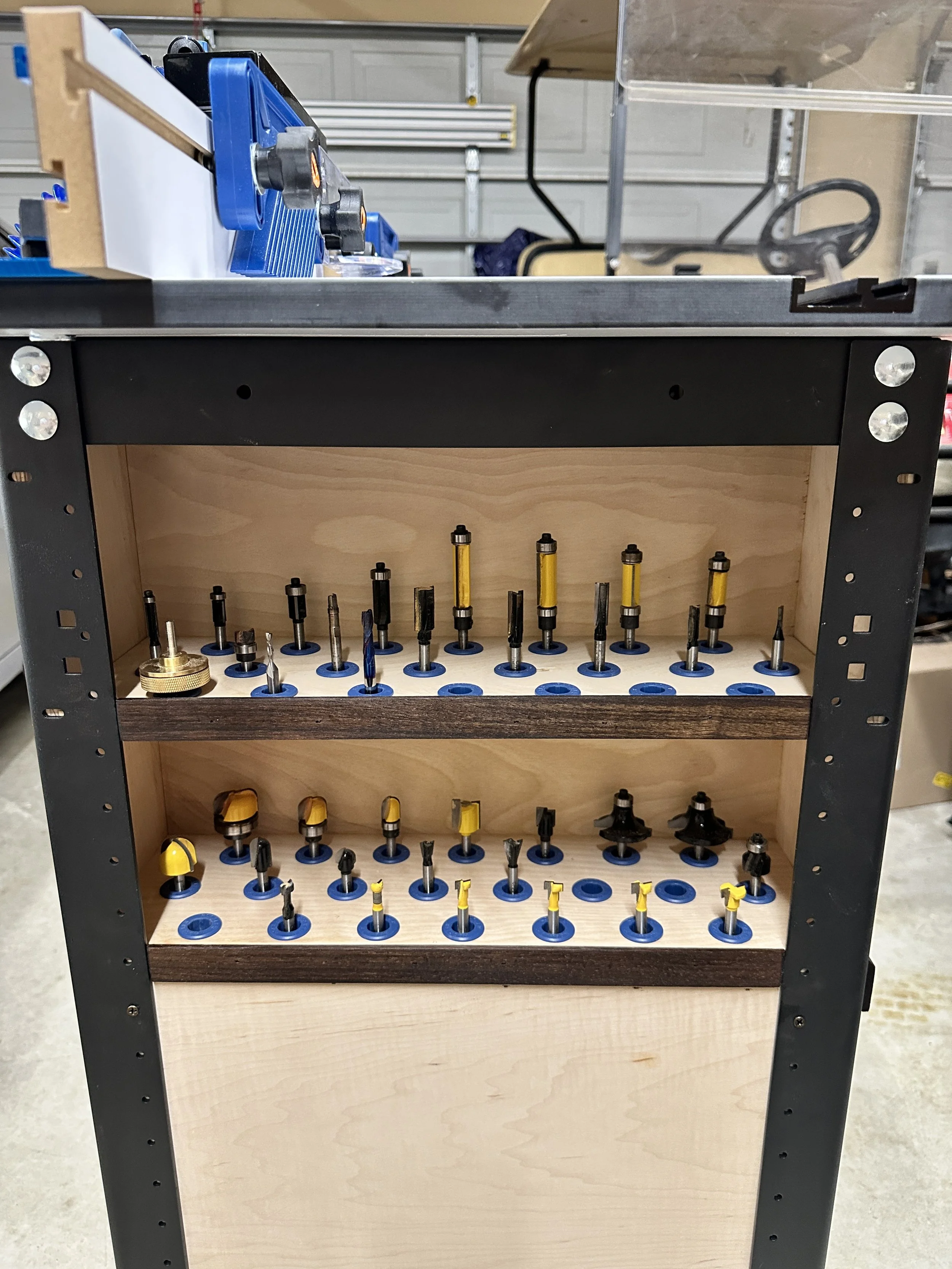 Rockler router table with bit storage.