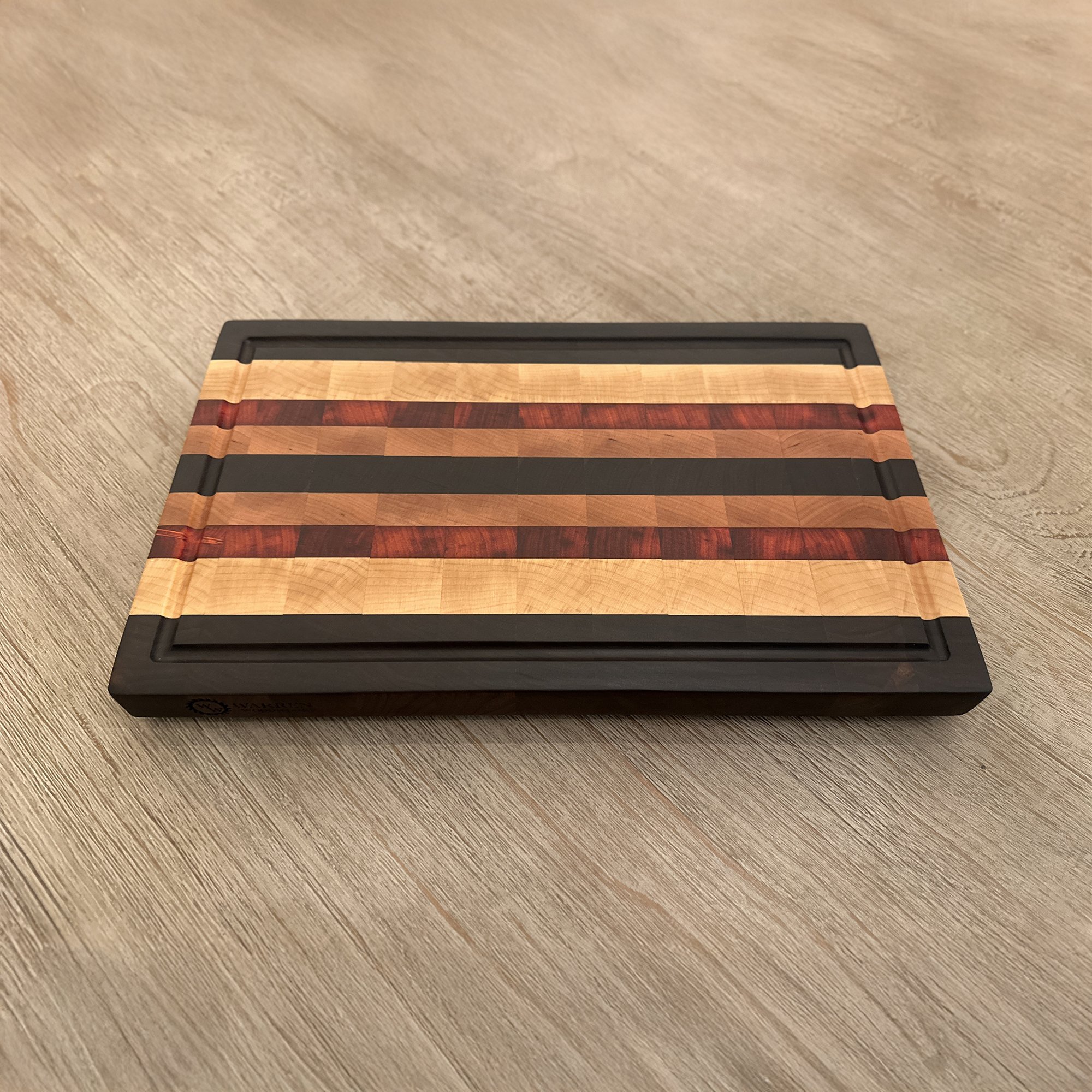 Beautiful End Grain Cutting Board designed from Walnut, Maple, Padauk, and Cherry hardwood. 16 x 10