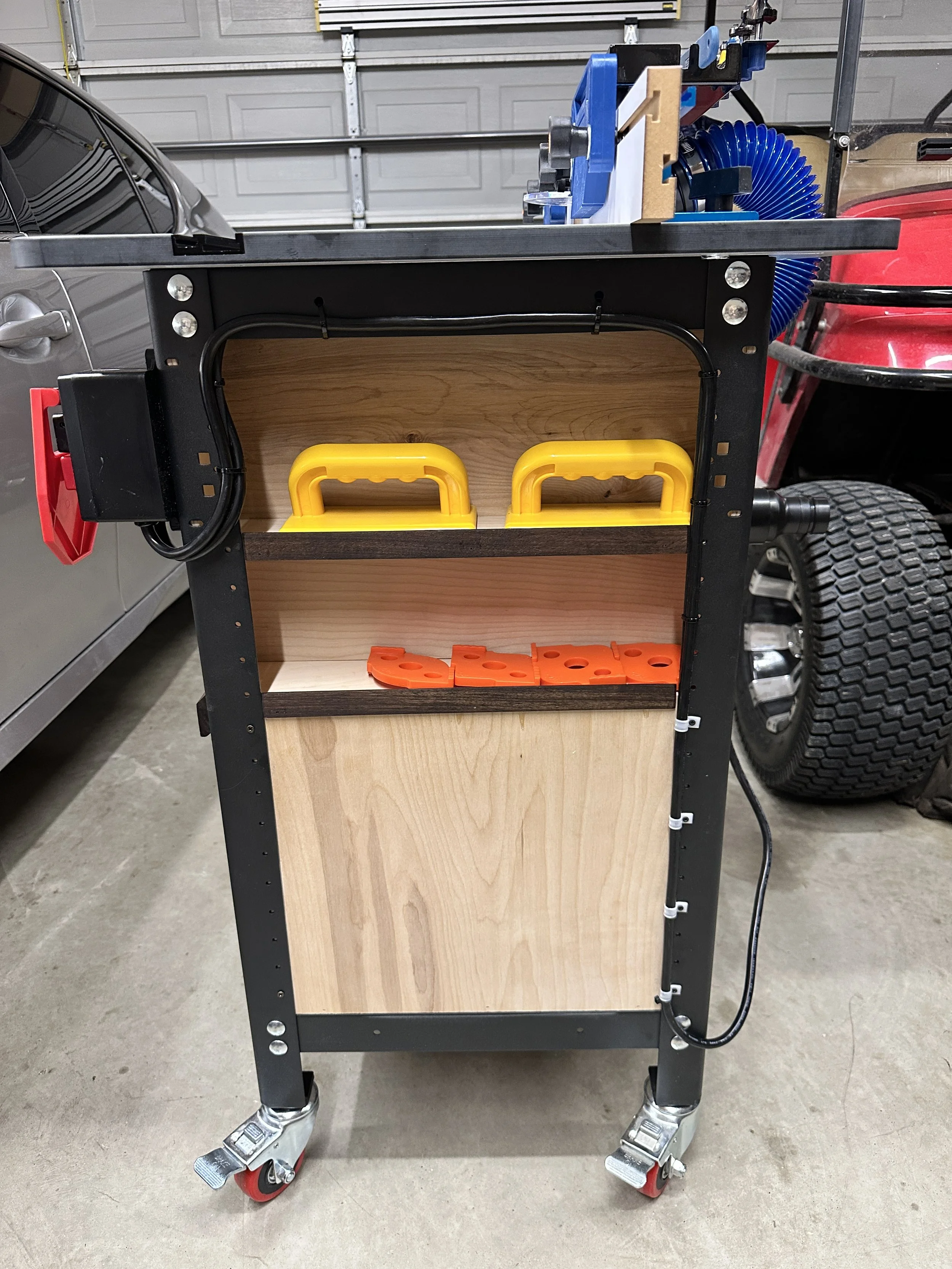 Rockler router table with accessory storage.