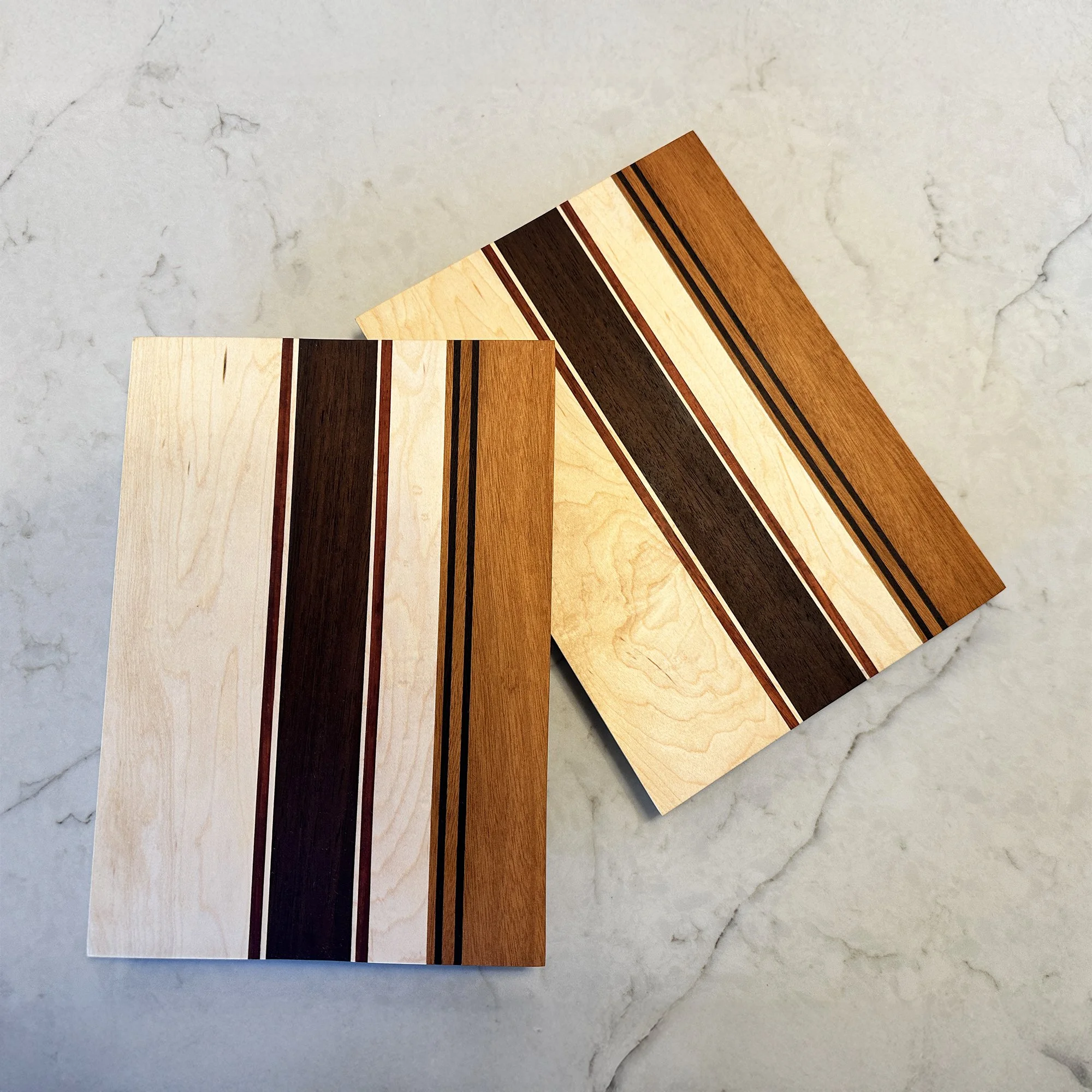 Twin 12 x 8 cutting boards for an Oklahoma State graduate. The board design is inspired by the OSU football helmets.