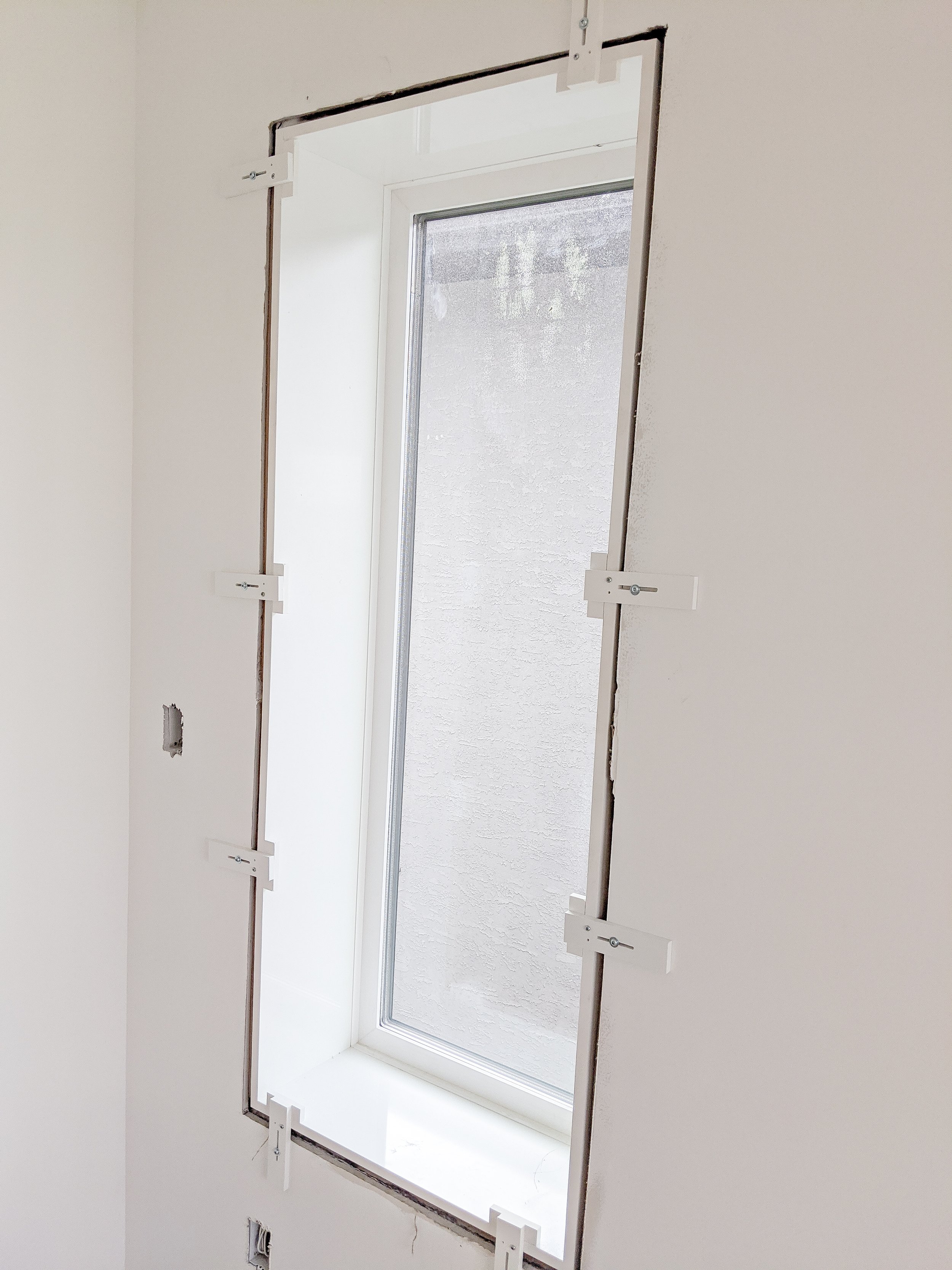 Window with a PVC Window Jamb Extension installed