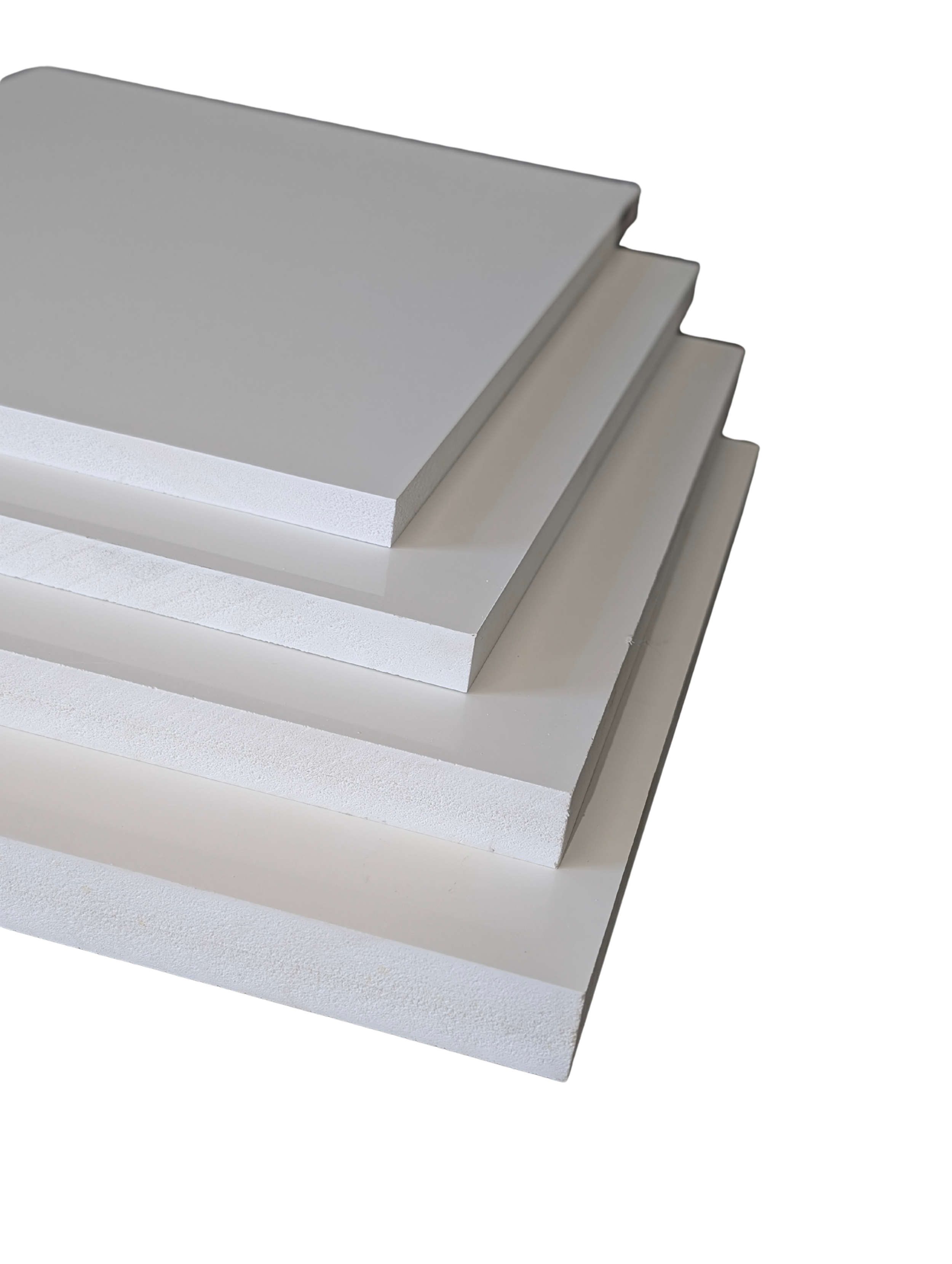 Close-up of the assortment of sizes of PVC sheets carried by Trim Rite Mfg. 3/8", 1/2", 5/8" and 3/4" sheets of PVC for finishing