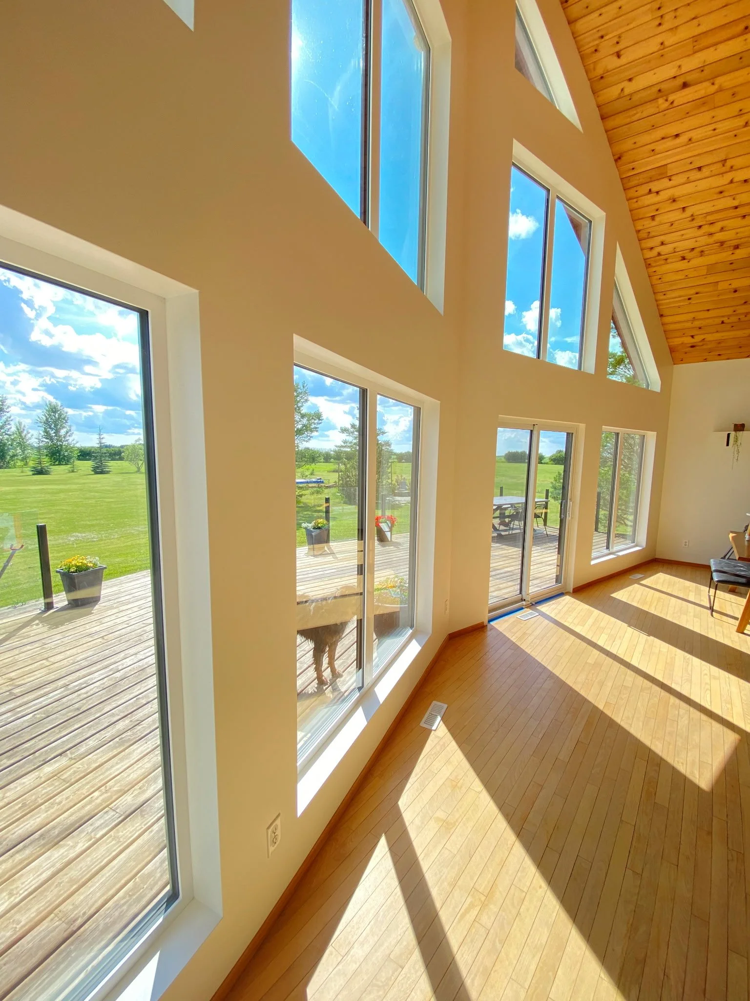 Window wall with Rakehead windows finished with Trimless PVC Jamb Extensions