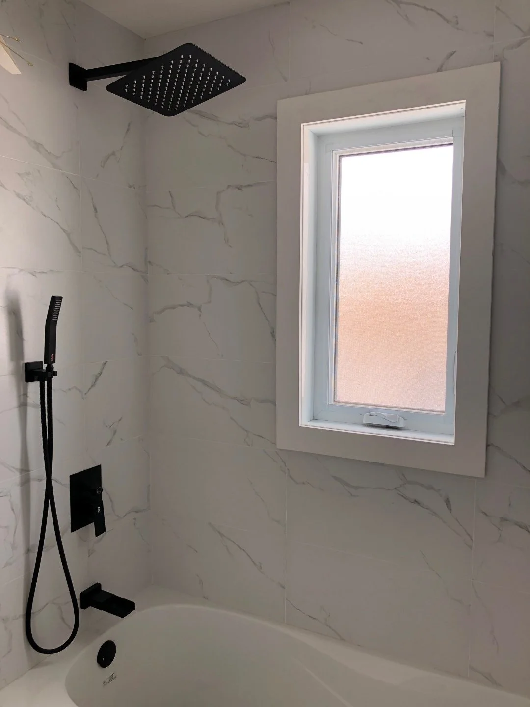 Shower window finished with moisture resistant PVC Window Jamb Extension and PVC Trim