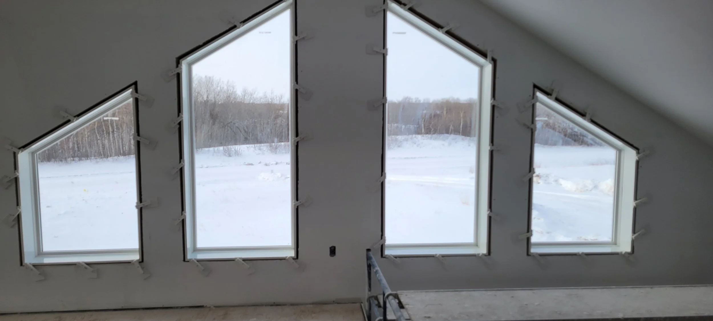 4  Rakehead windows finished with PVC Jamb Extensions