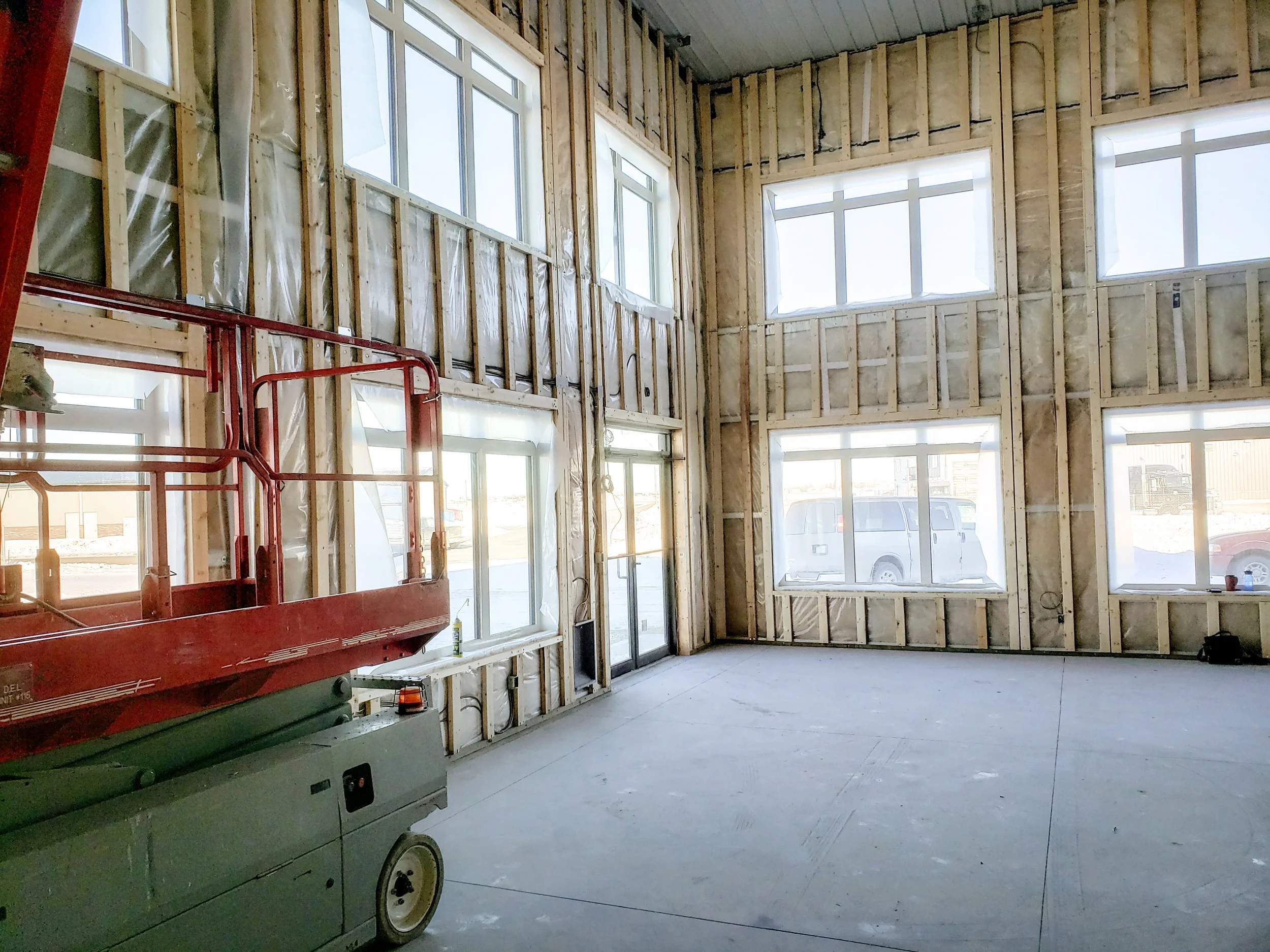 Commercial space windows with PVC Window Jamb Extensions installed