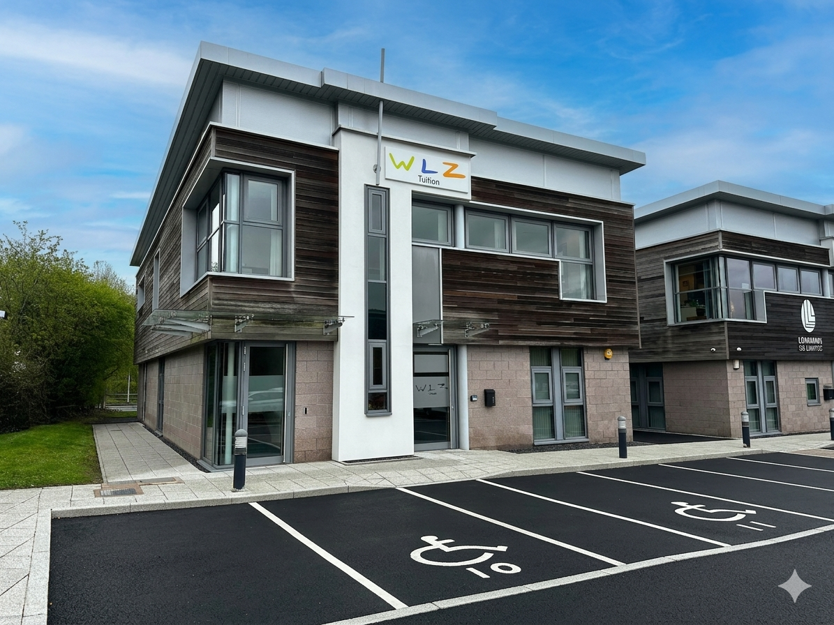 Modern multi-story building with pharmacy and educational offices, parking lot with accessible spaces, clear sky.