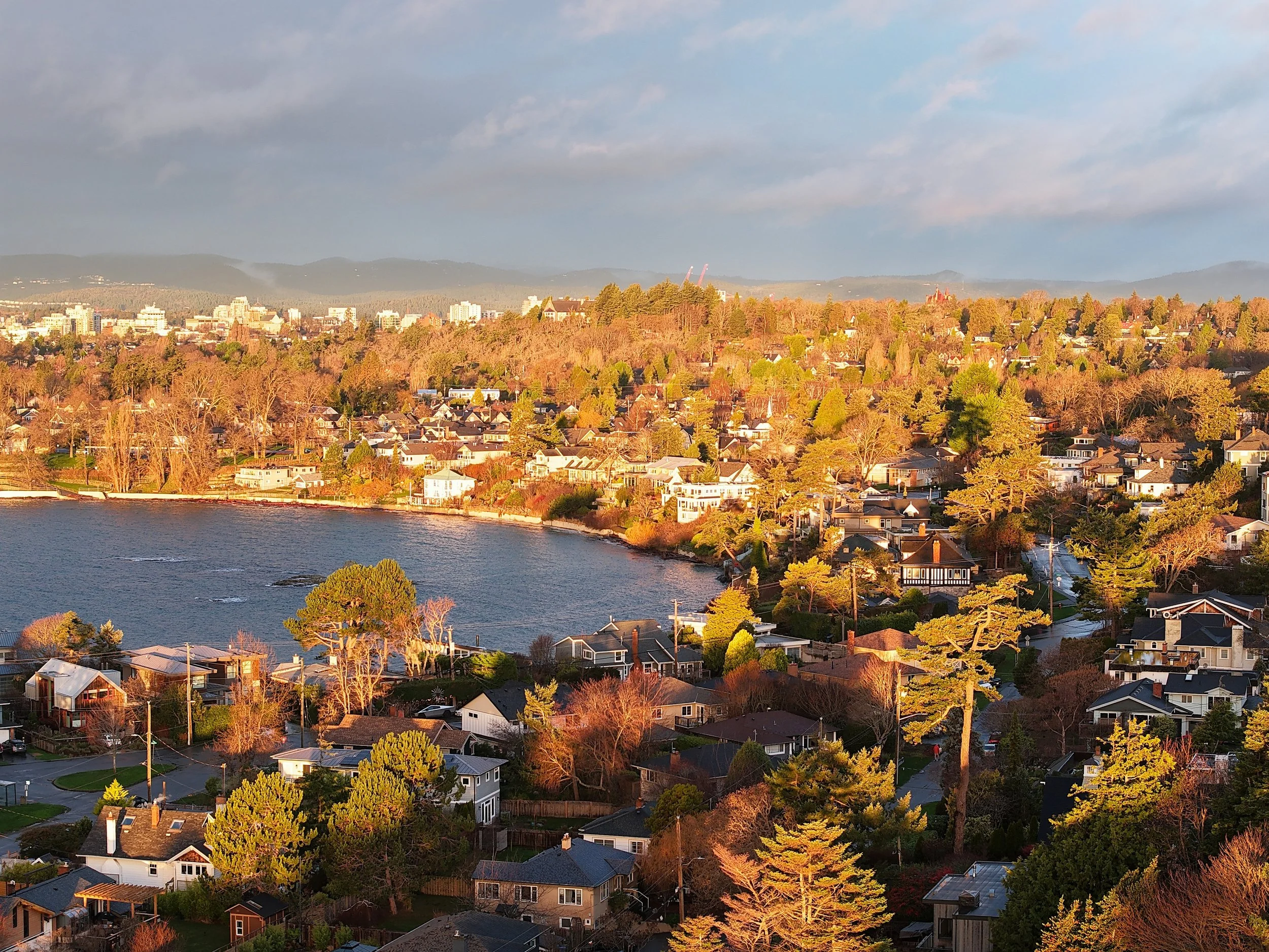 Early morning light over Gonzales Bay, with late-season color still visible along the shoreline. The bay sits quietly under a muted winter sky, offering a familiar and peaceful coastal view on Victoria’s east side.