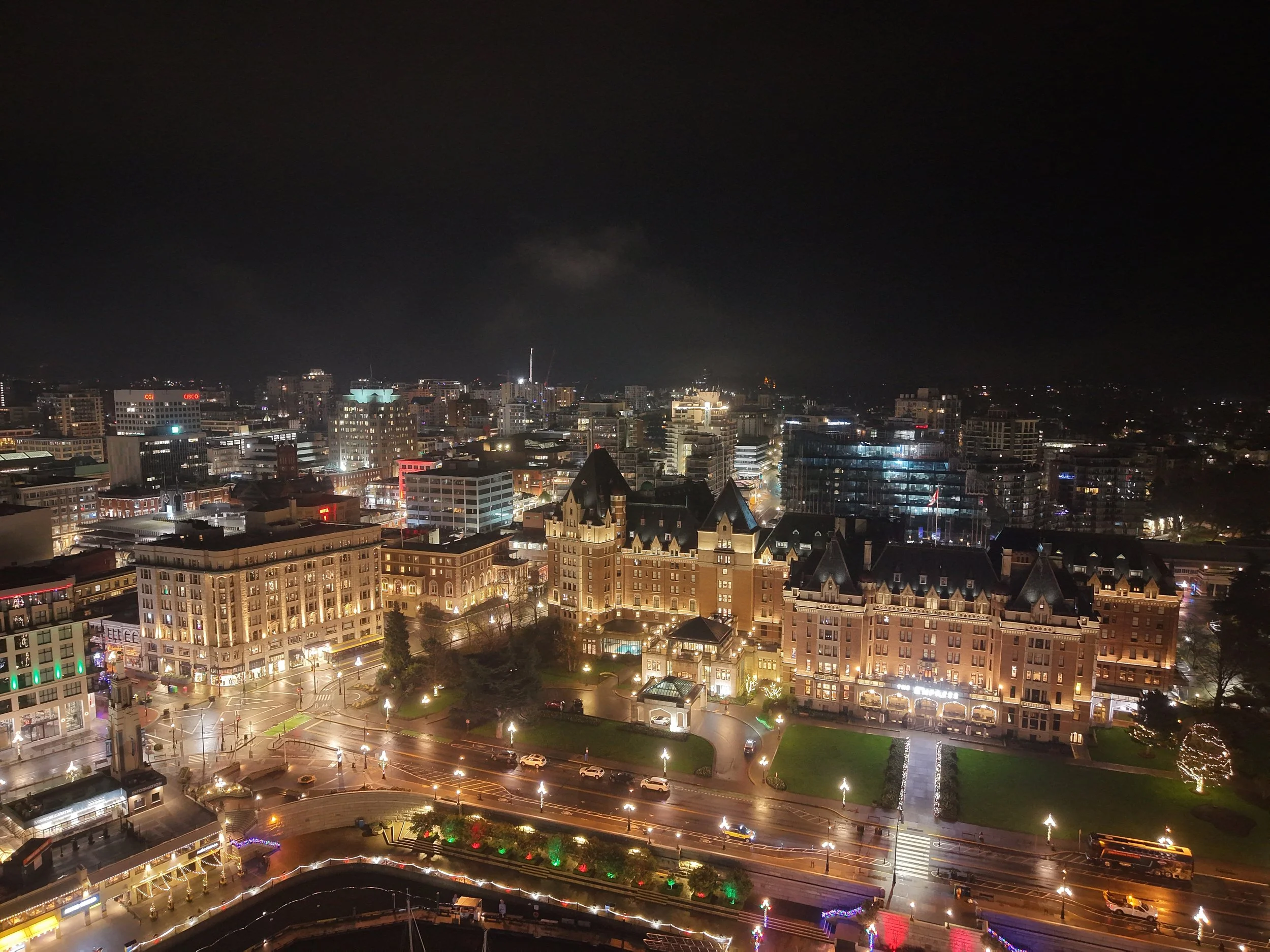 A calm, misty night over Victoria’s Inner Harbor, captured from above.