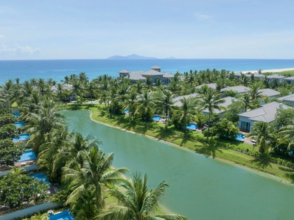 Danang Marriott Resort & Spa luxury beachfront villas with lagoon views, palm trees, and direct access to Non Nuoc Beach.