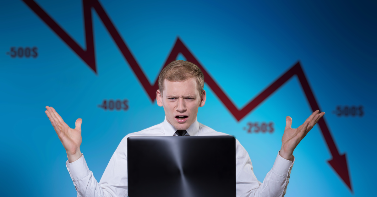 Vacation Rental Property Management Errors- Shocked businessman at dropping stocks