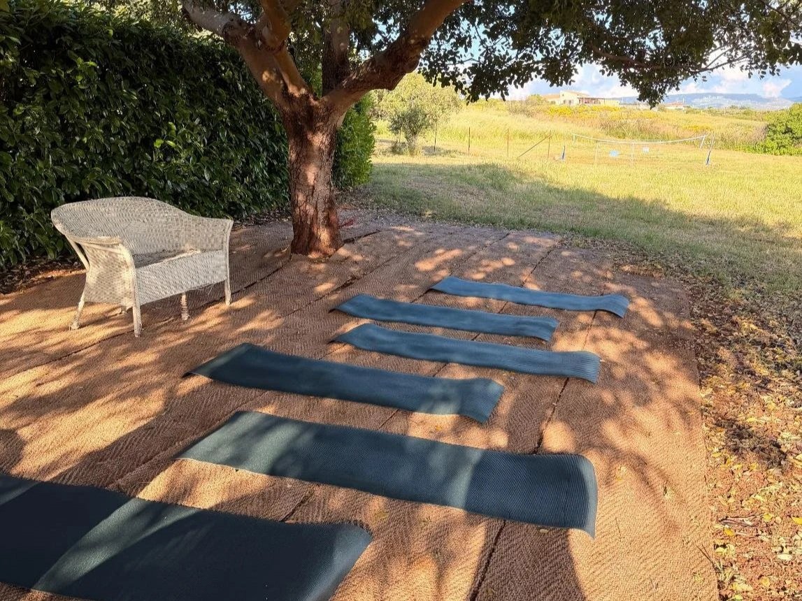 Sicily_YogaMats_WickerChair_LandscapeView.jpg