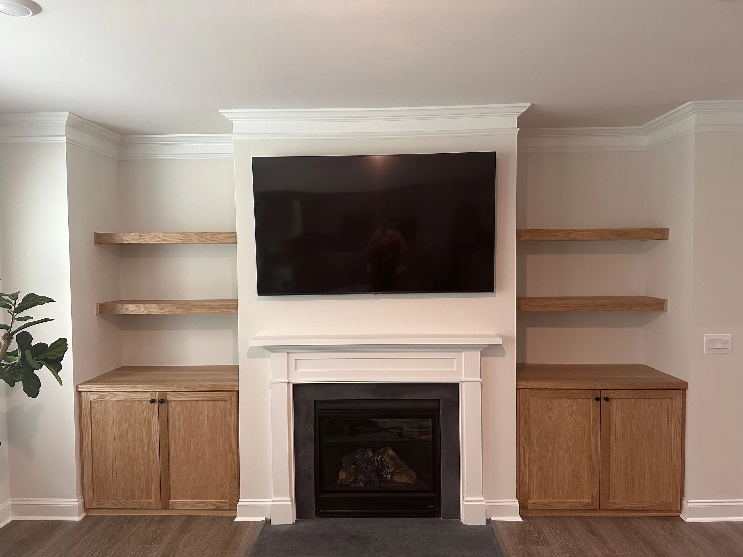 White oak cabinets and floating shelves