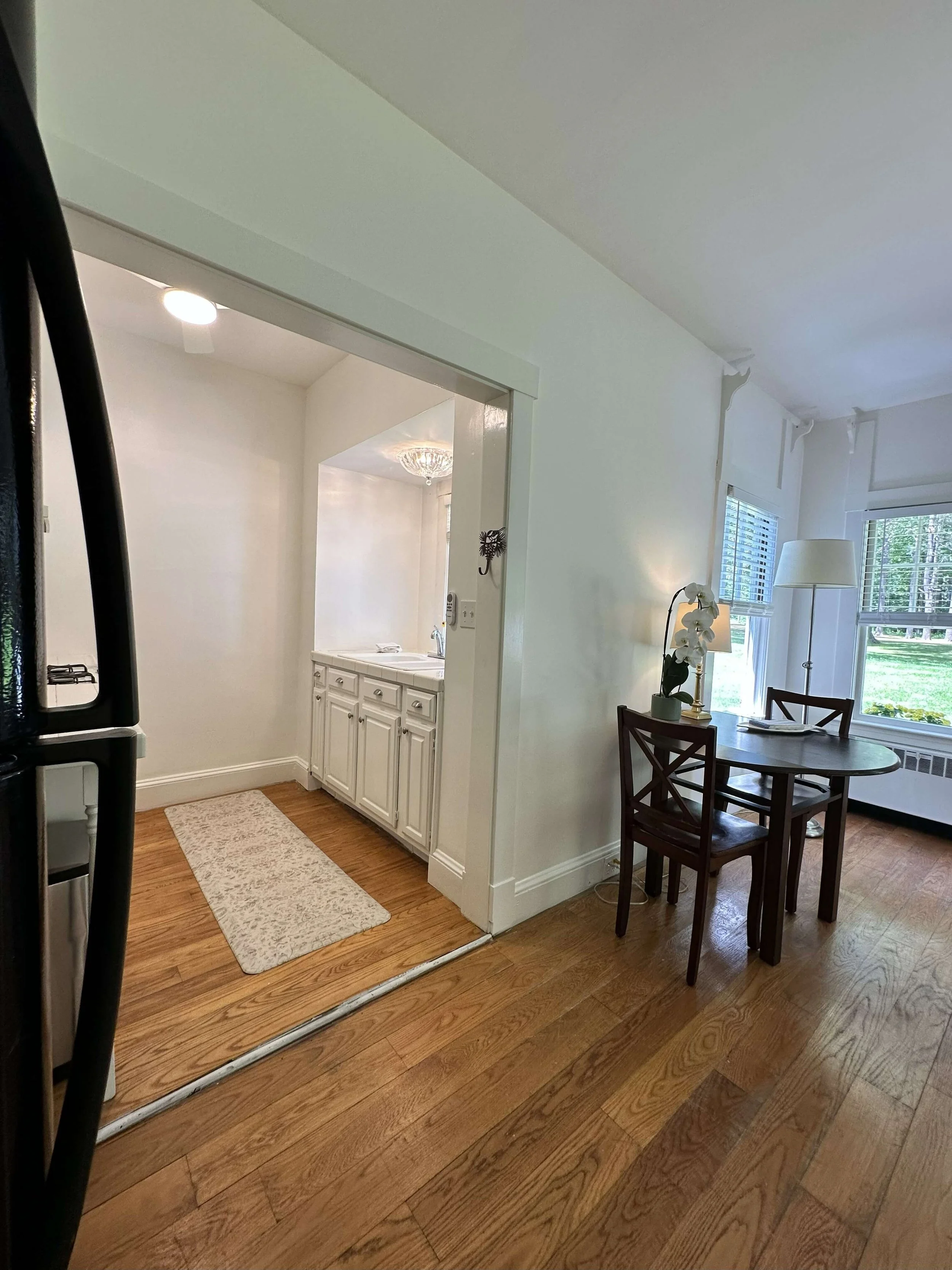 Kitchen and dining room Elizabeth Cottage Historic Lakefront Vacation Home Belgrade Lakes Maine.jpg
