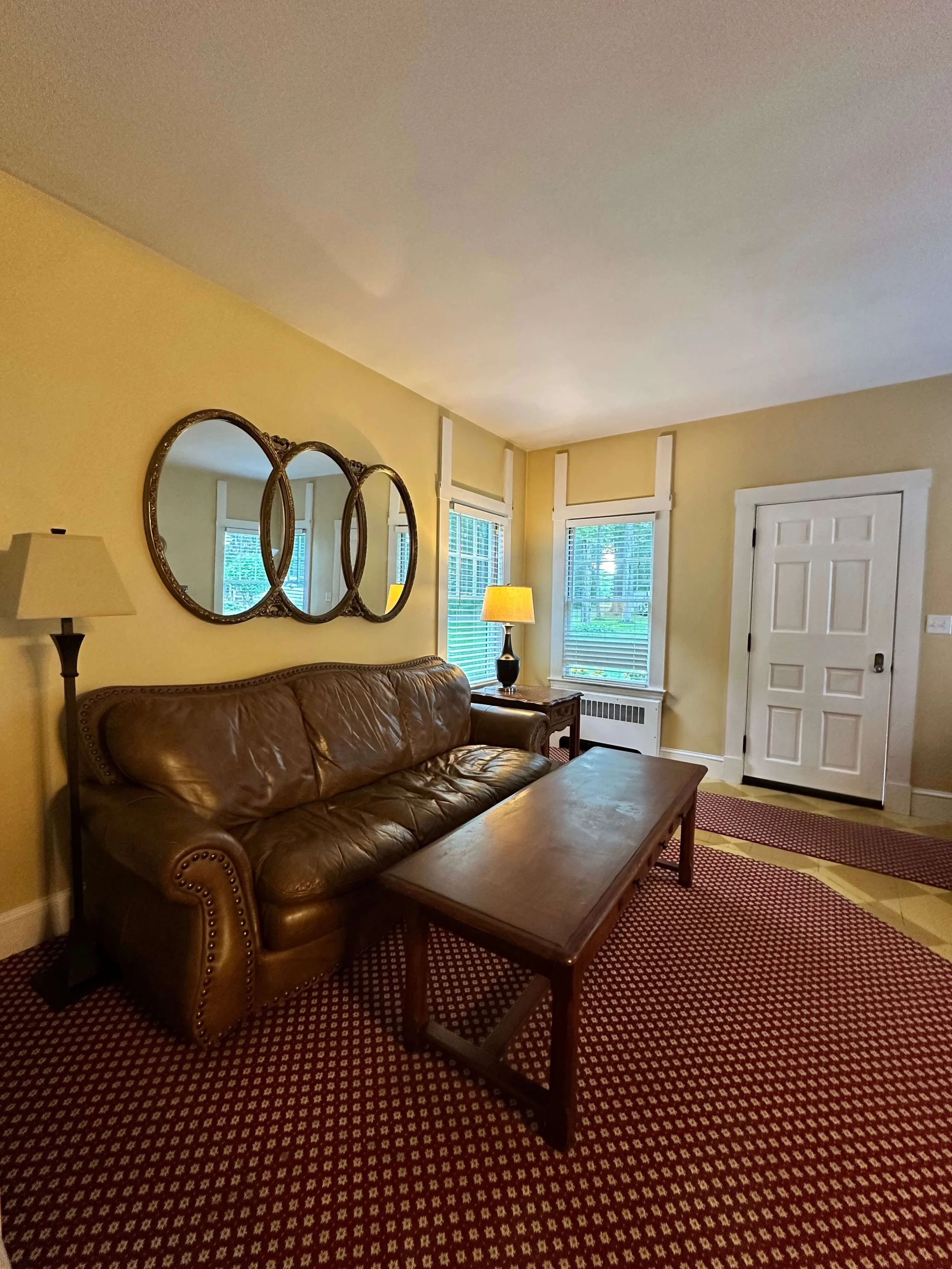 Comfortable Leather Sofa Vacation Historic Lakefront Home Belgrade Lakes Maine.jpg