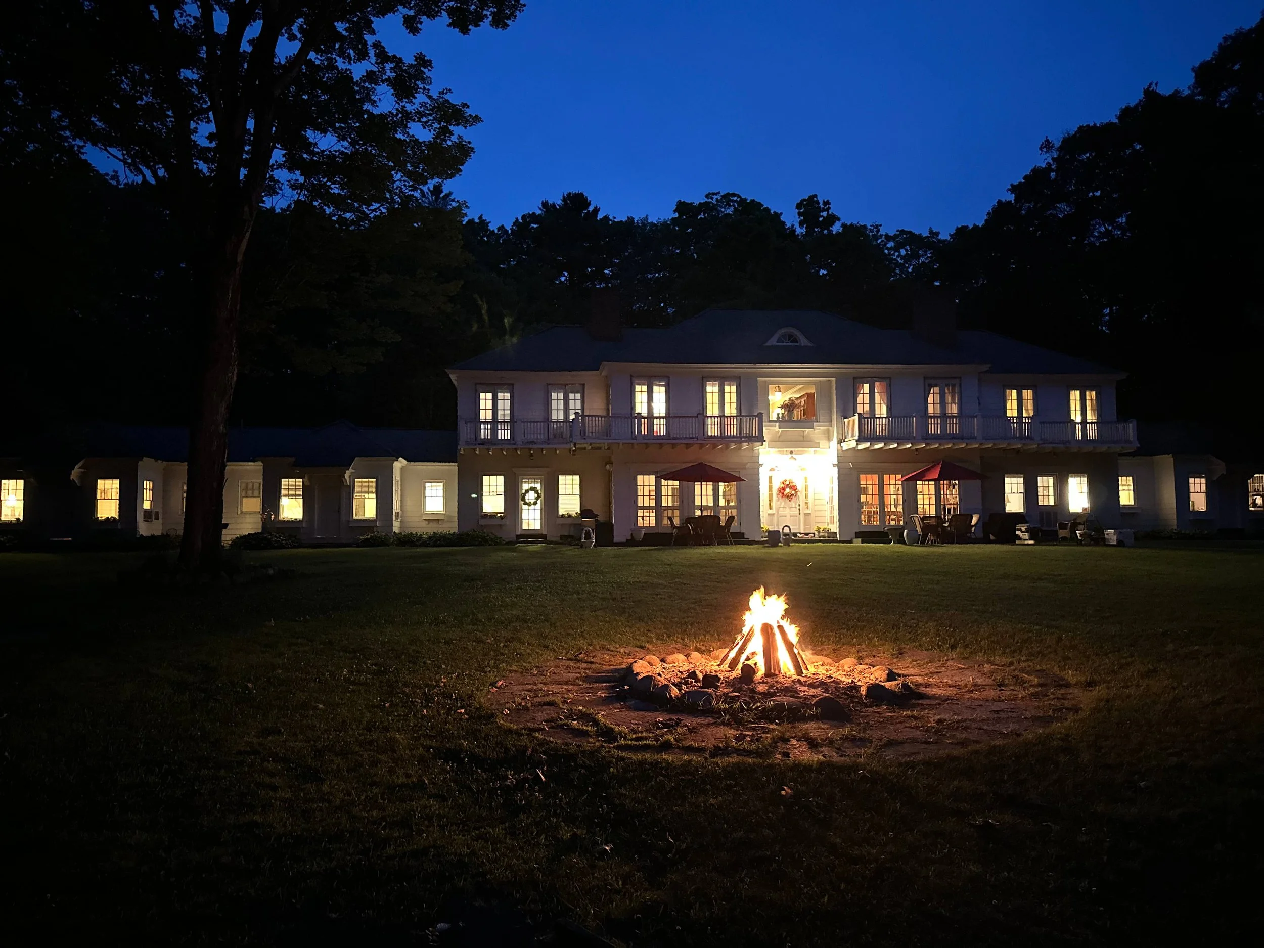 Back of House with Fire at Night Starry Sky.jpg