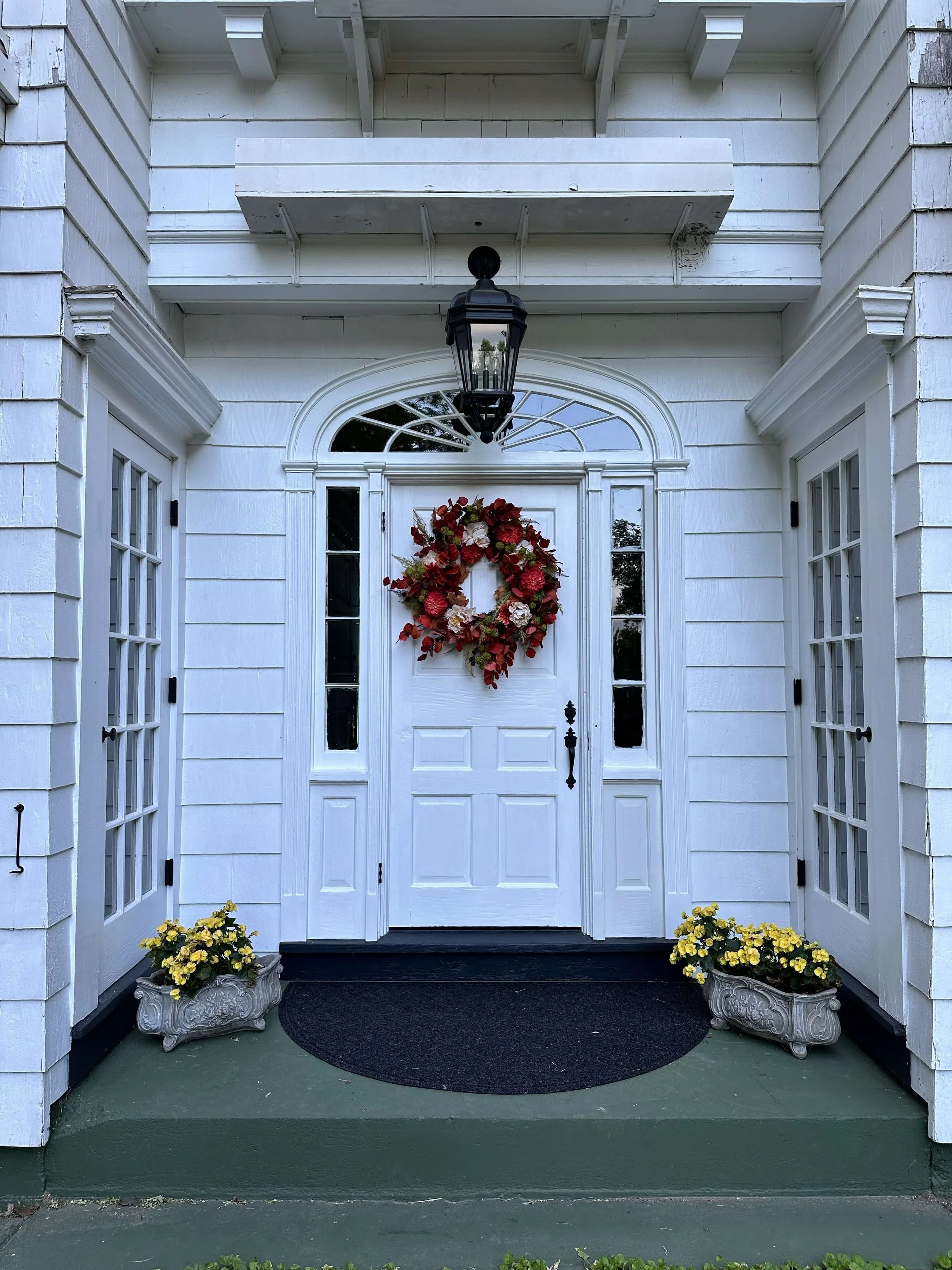 Backdoor of Historic Home with Flowers.jpg