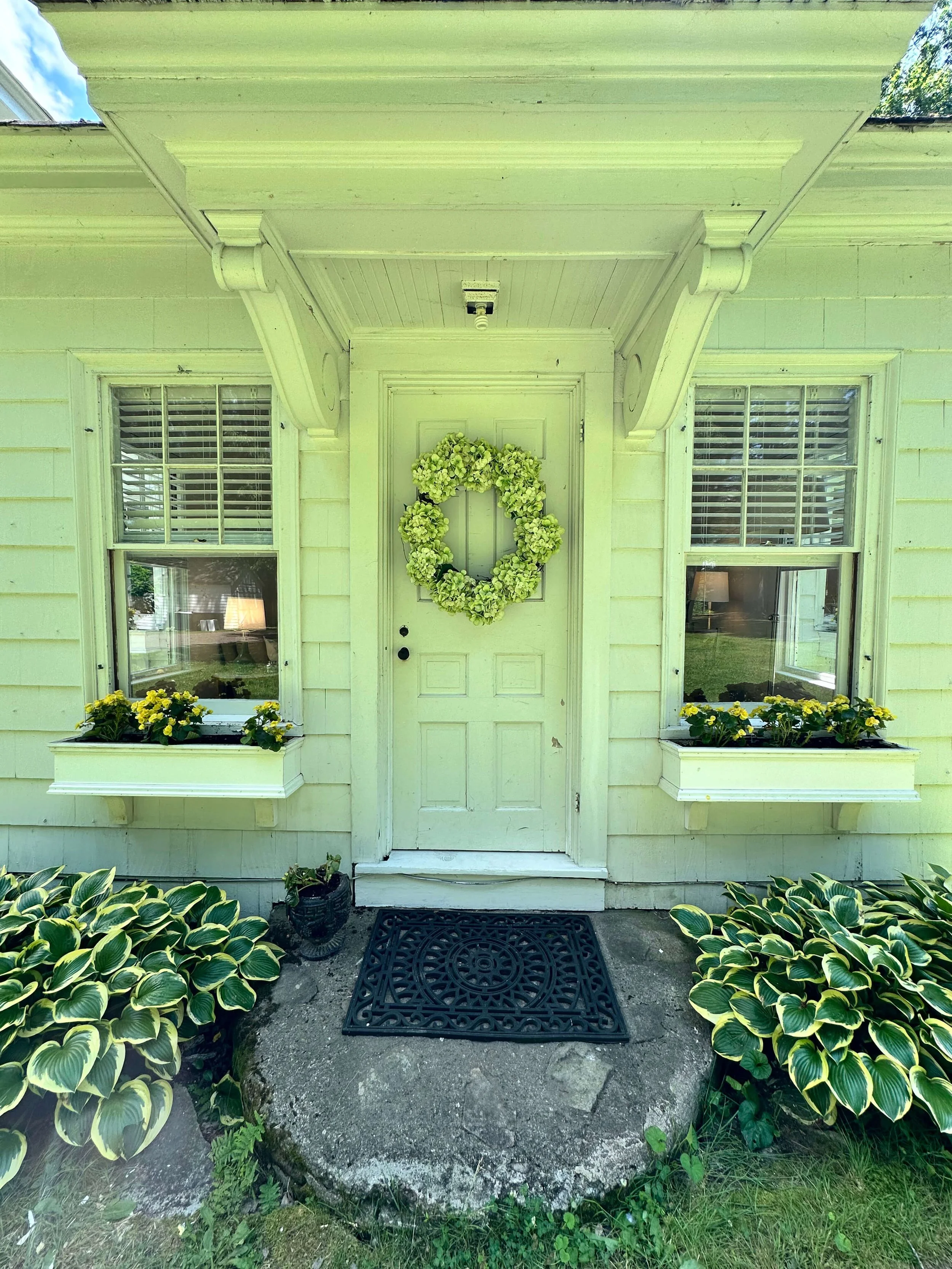 Elizabeth Cottage Historic Lakefront Vacation Home Belgrade Lakes Maine front door private entry flower garden