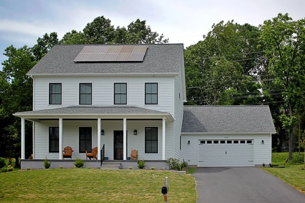 House with solar panels on the roof.