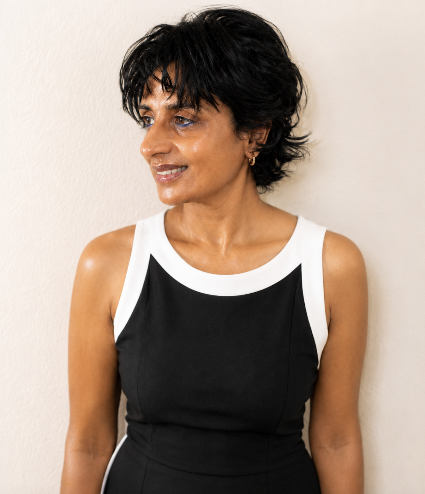 Professional portrait of Asha Paul, Board-Certified Holistic Health Practitioner, healthy aging educator, author, and host of The Empowered Life Podcast.