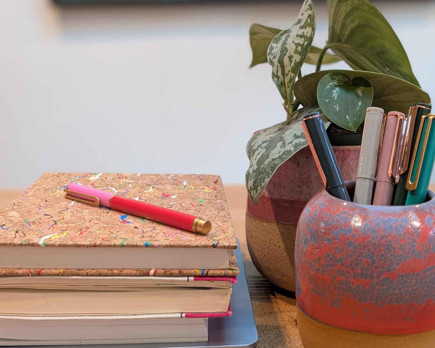 Social media marketer with notebook and pens